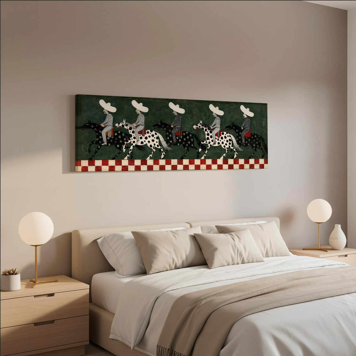 Riders in sombreros on spotted horses wide panoramic canvas print above a bed in a neutral bedroom