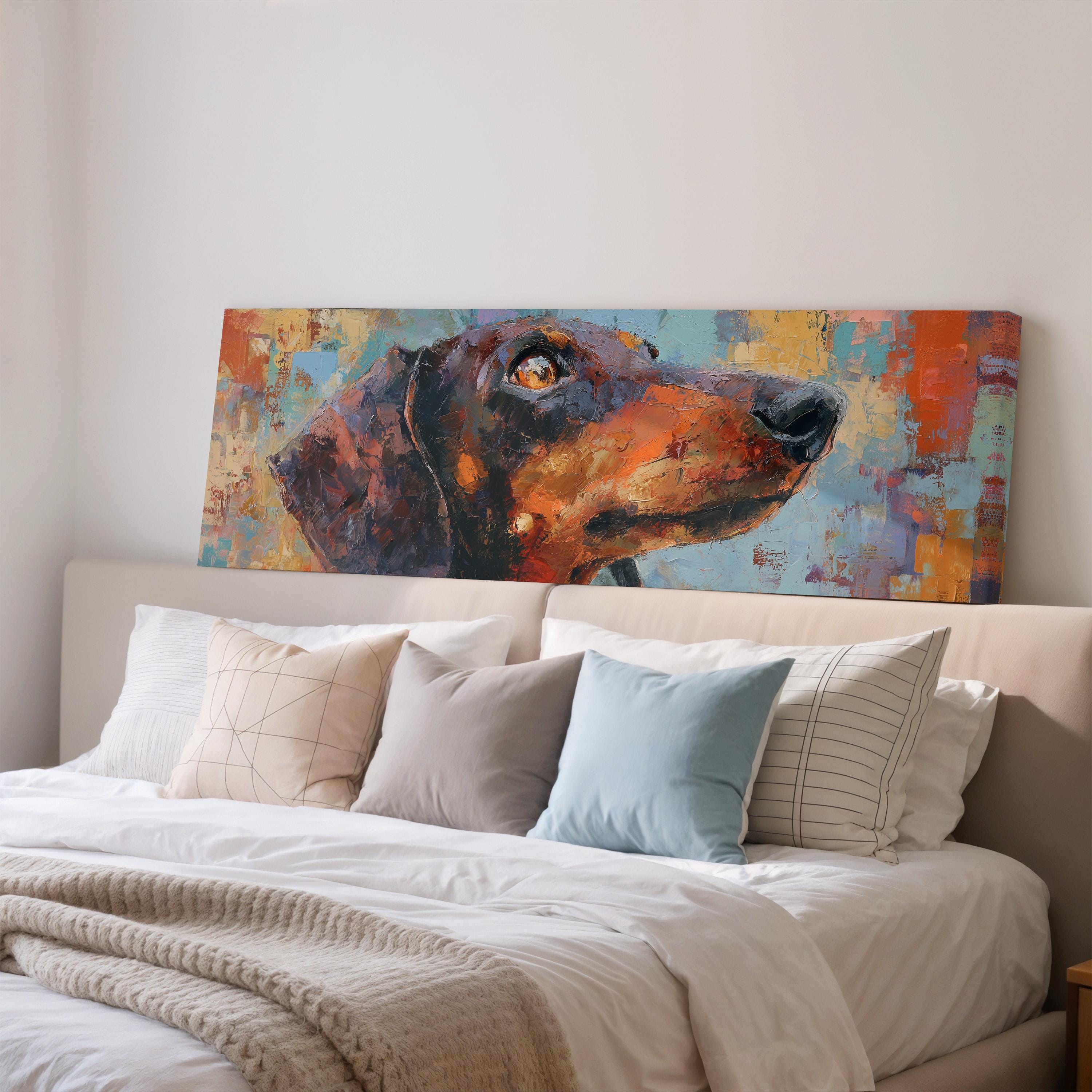 a large painting of a dog's head on a wall above a bed with white bedding and pillows.