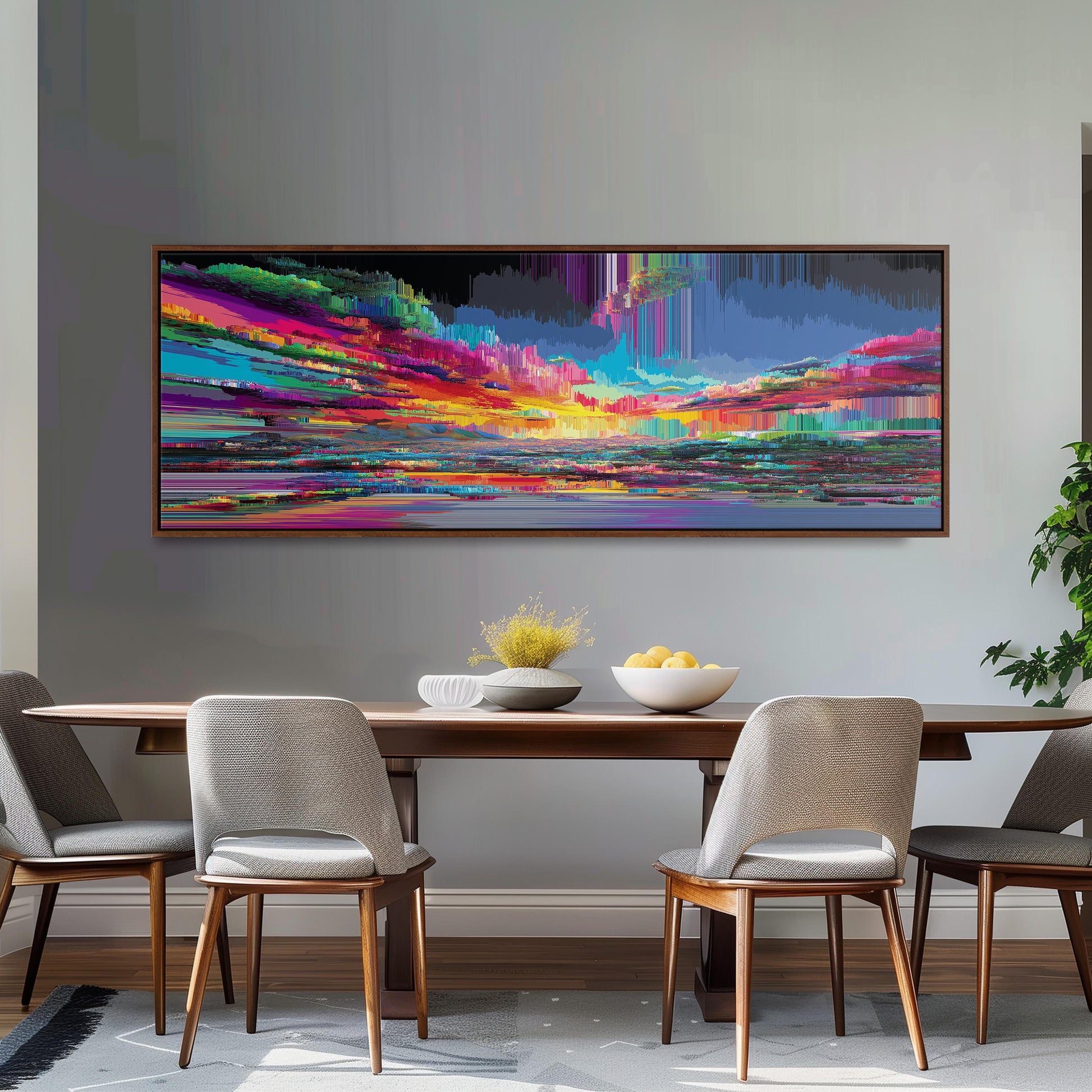 a dining room with a large, colorful abstract painting hanging on the wall above a wooden dining table. The table is set with a bowl of fruit and a vase of flowers, creating a welcoming and vibrant atmosphere.
