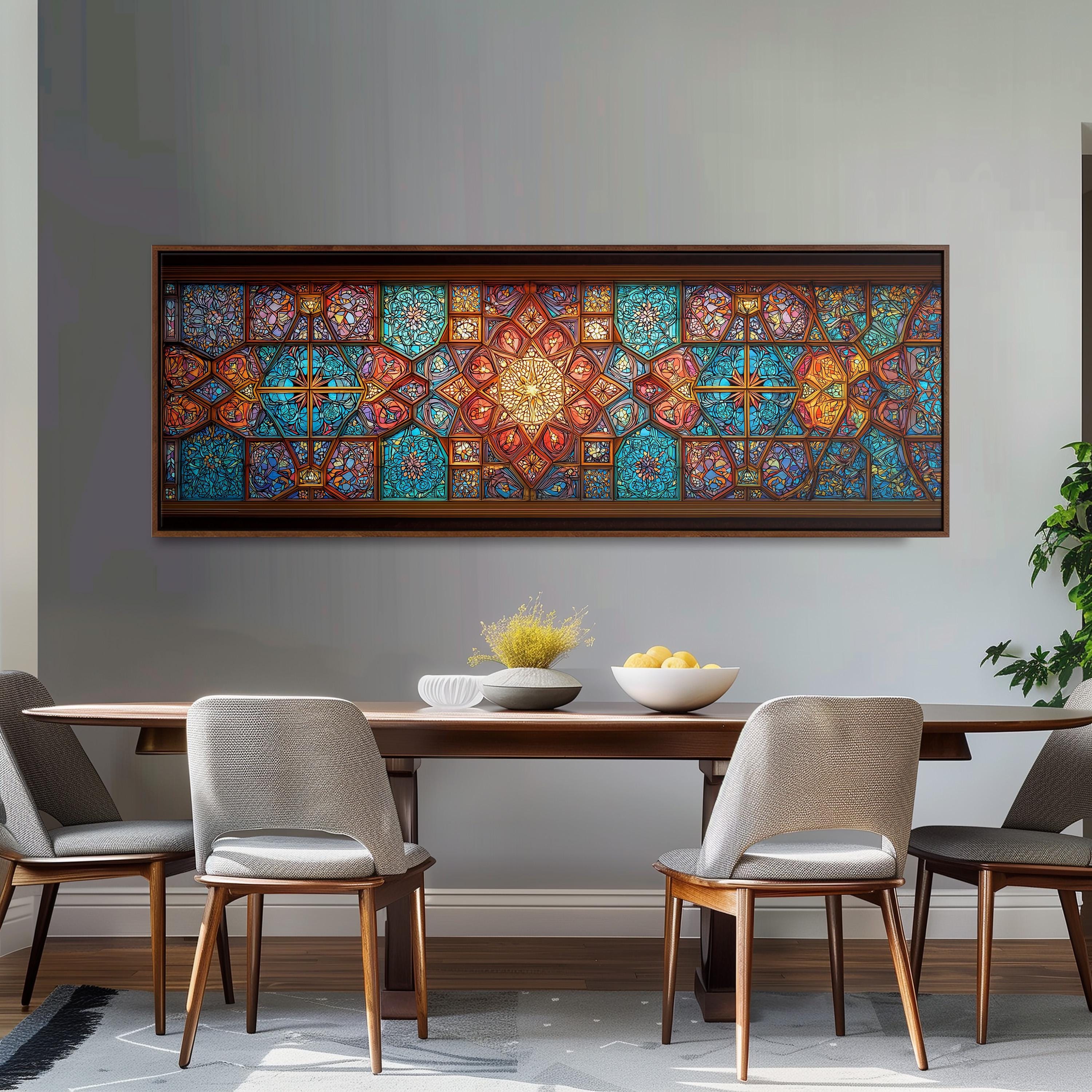 a dining room with a wooden table and four chairs. Above the table, there is a large, colorful stained glass window. On the table, there is a bowl of fruit and a vase of flowers.
