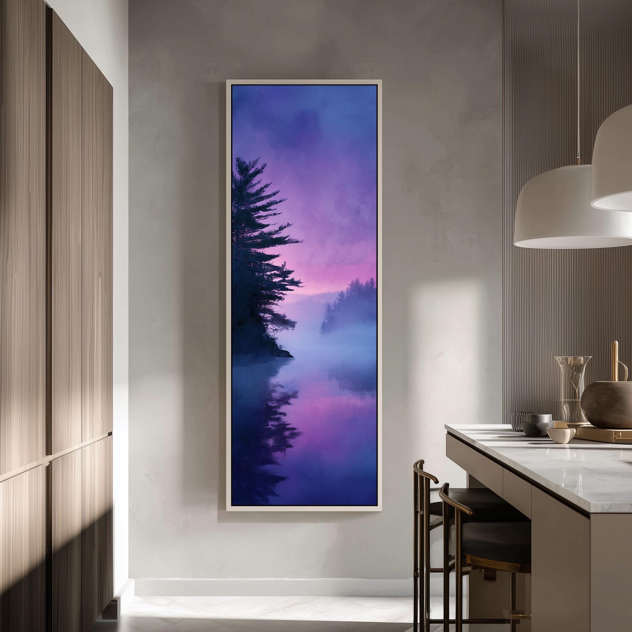 a large, framed painting of a serene landscape with a misty lake and a forest in the background, hanging on a wall in a modern, minimalist kitchen.