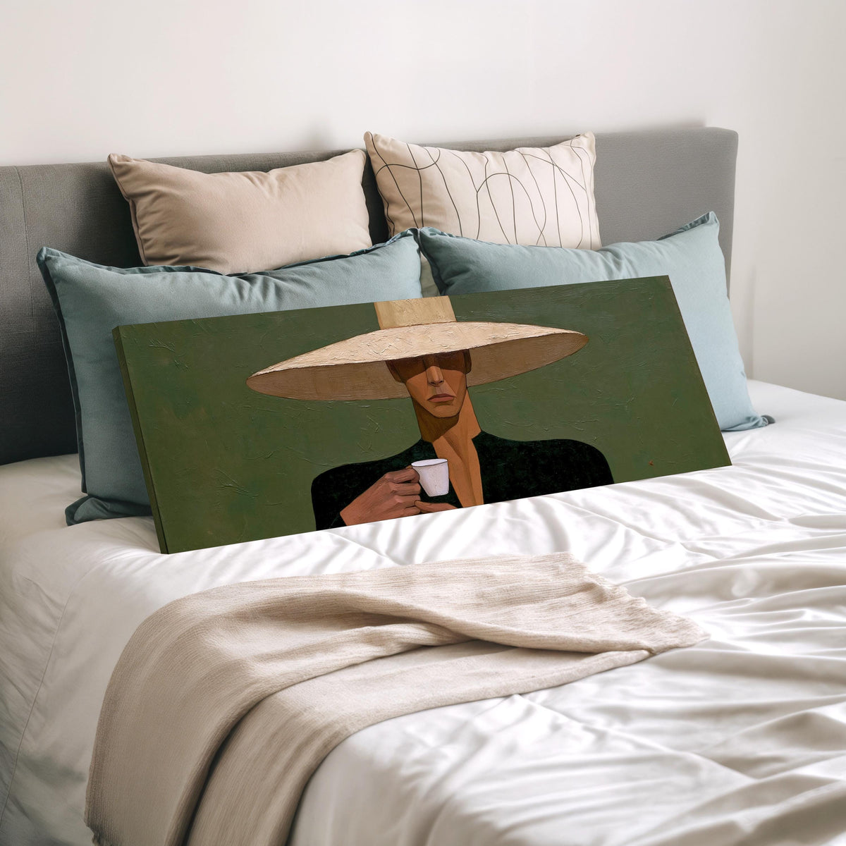 Shadowed woman in a sun hat with espresso wide panoramic canvas print laid on a bed to show its size