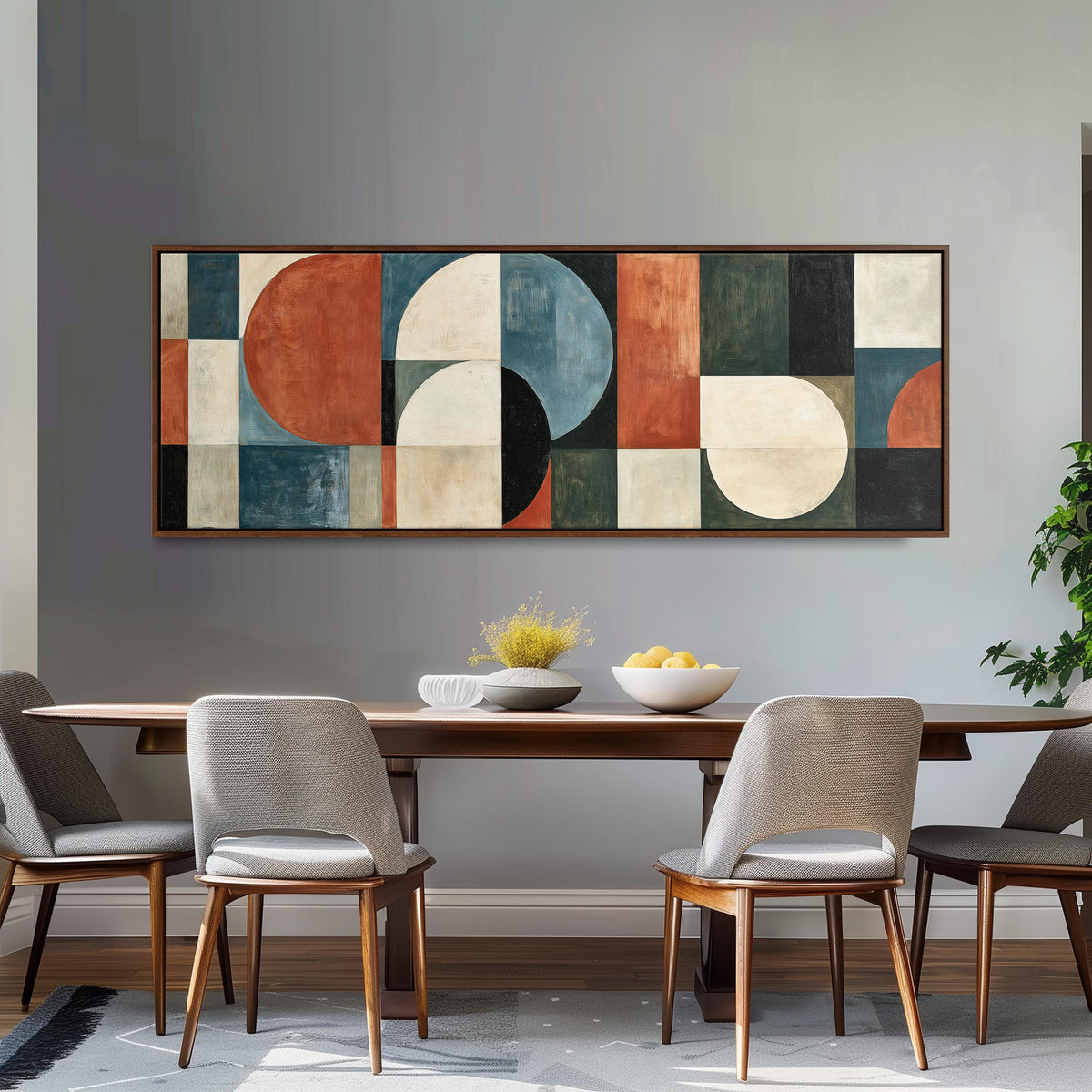 Rust and blue geometric arches and circles long horizontal canvas print above a dining table