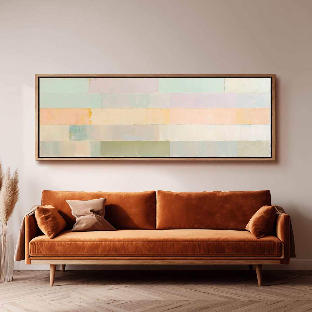 Soft lilac, mint and butter color bands panoramic canvas print above a sofa in a living room