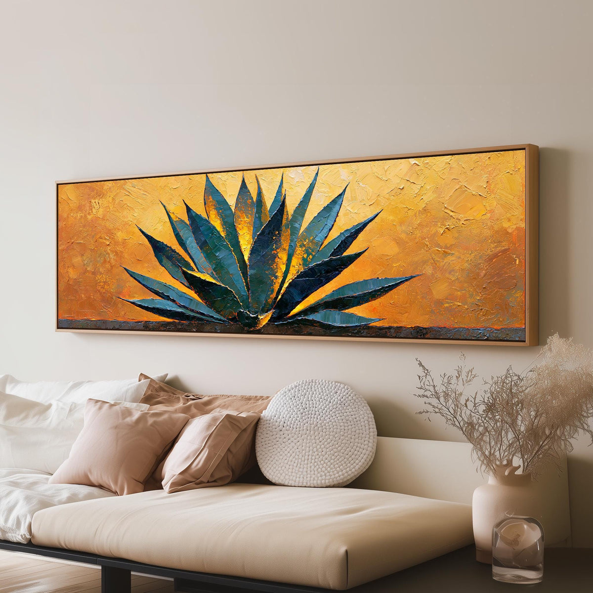 Blue agave on a textured gold background long horizontal canvas print above a sofa in a living room