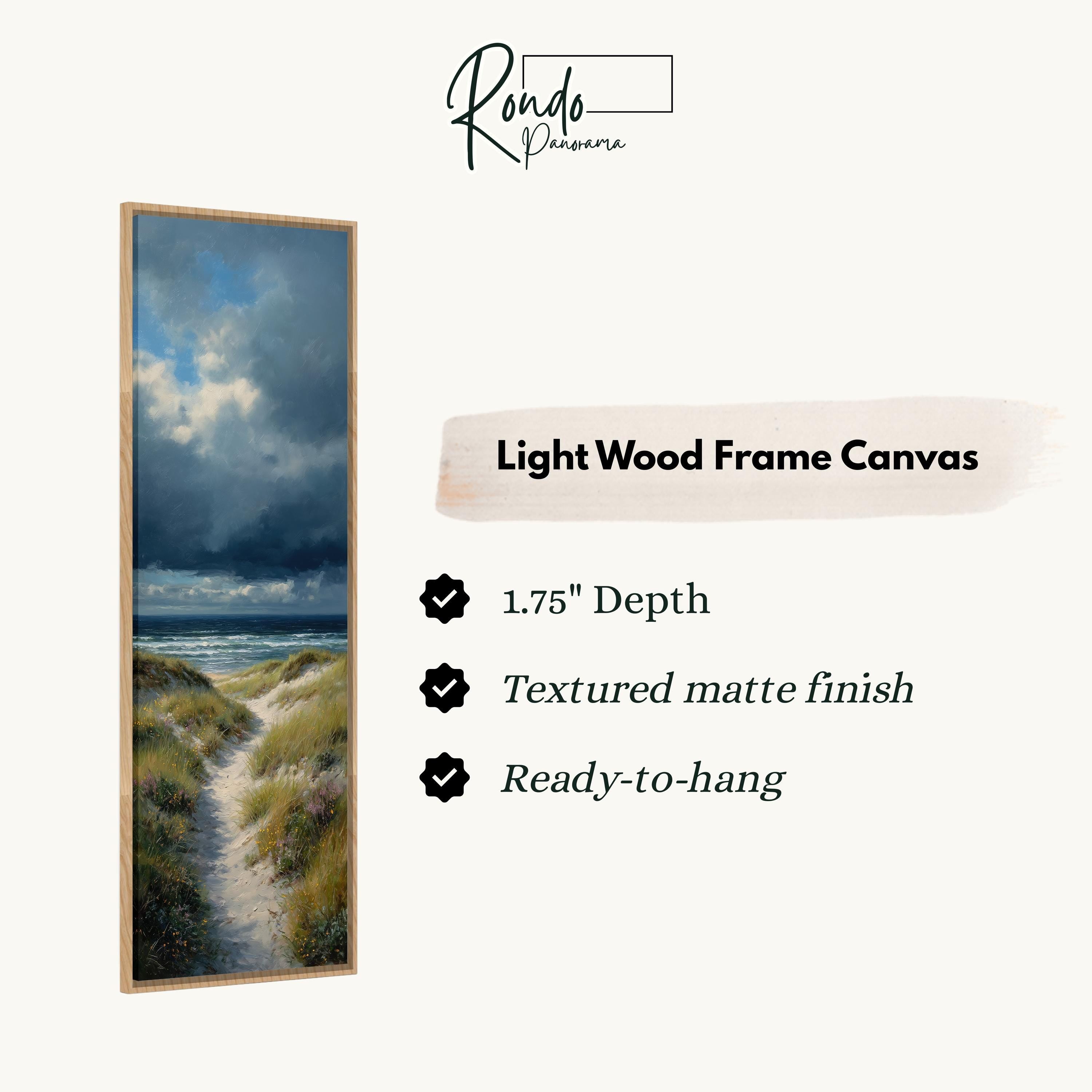 The image is a rectangular frame with a painting of a beach scene inside it. The frame has a light wood finish and is described as a canvas with a 1.75" depth, a textured matte finish, and a ready-to-hang feature.
