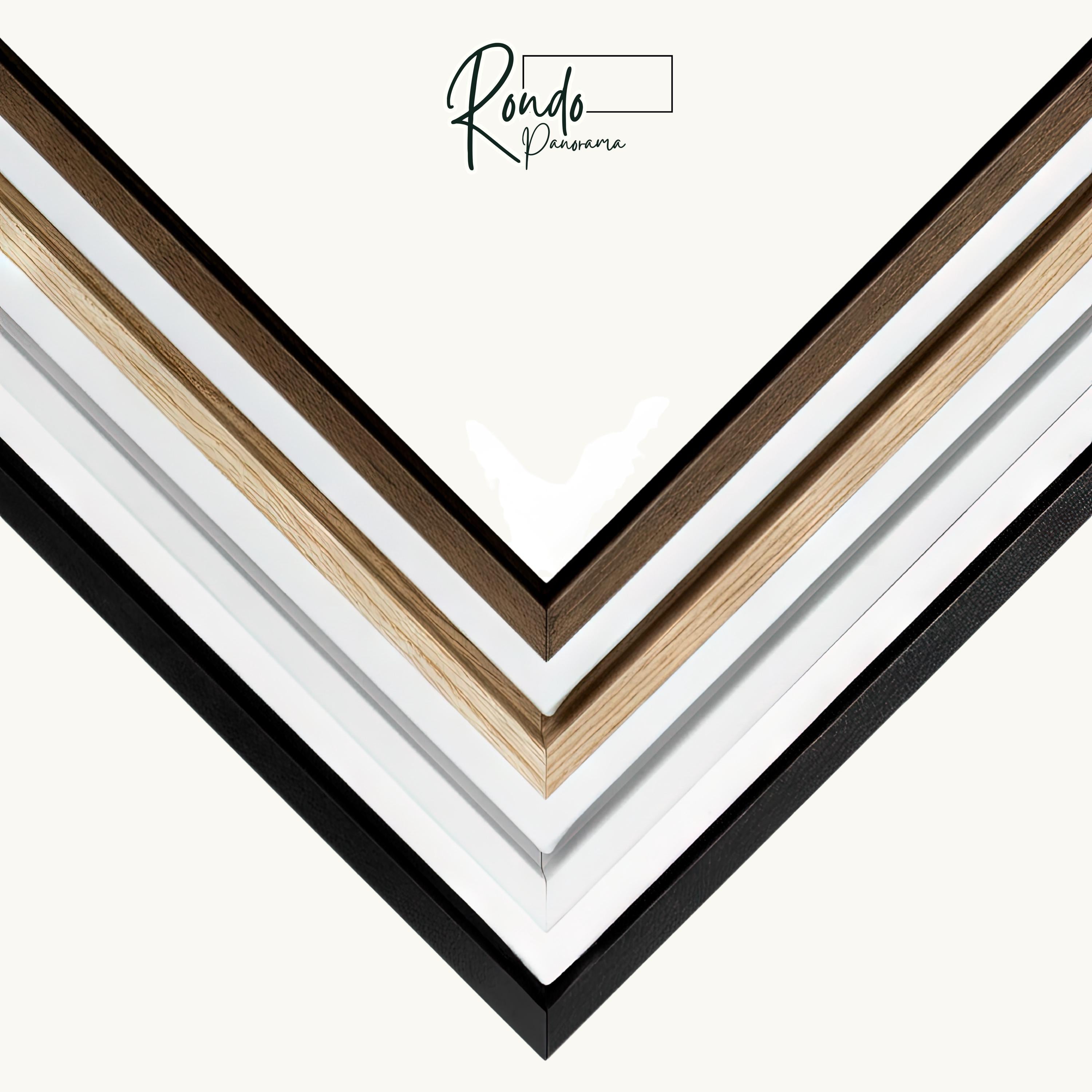 a collection of various colored wooden frames arranged in a diagonal pattern, creating a visually striking and artistic composition.