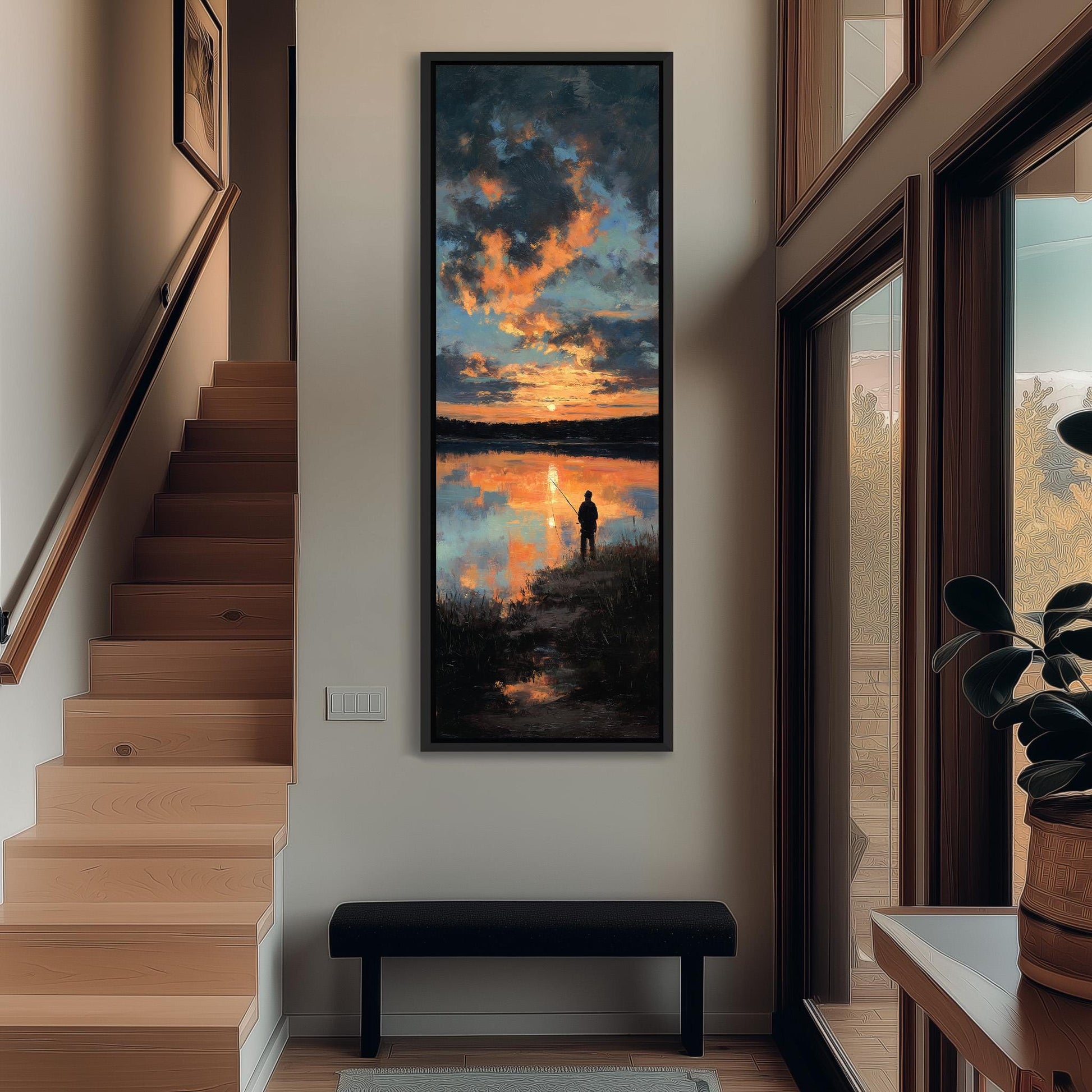 a serene indoor setting with a large painting of a sunset over a lake hanging on the wall. The painting depicts a person standing on the shore, silhouetted against the vibrant colors of the sky. The room has wooden stairs leading up to a door, and a bench is situated in the foreground. A potted plant is visible on the right side of the image.