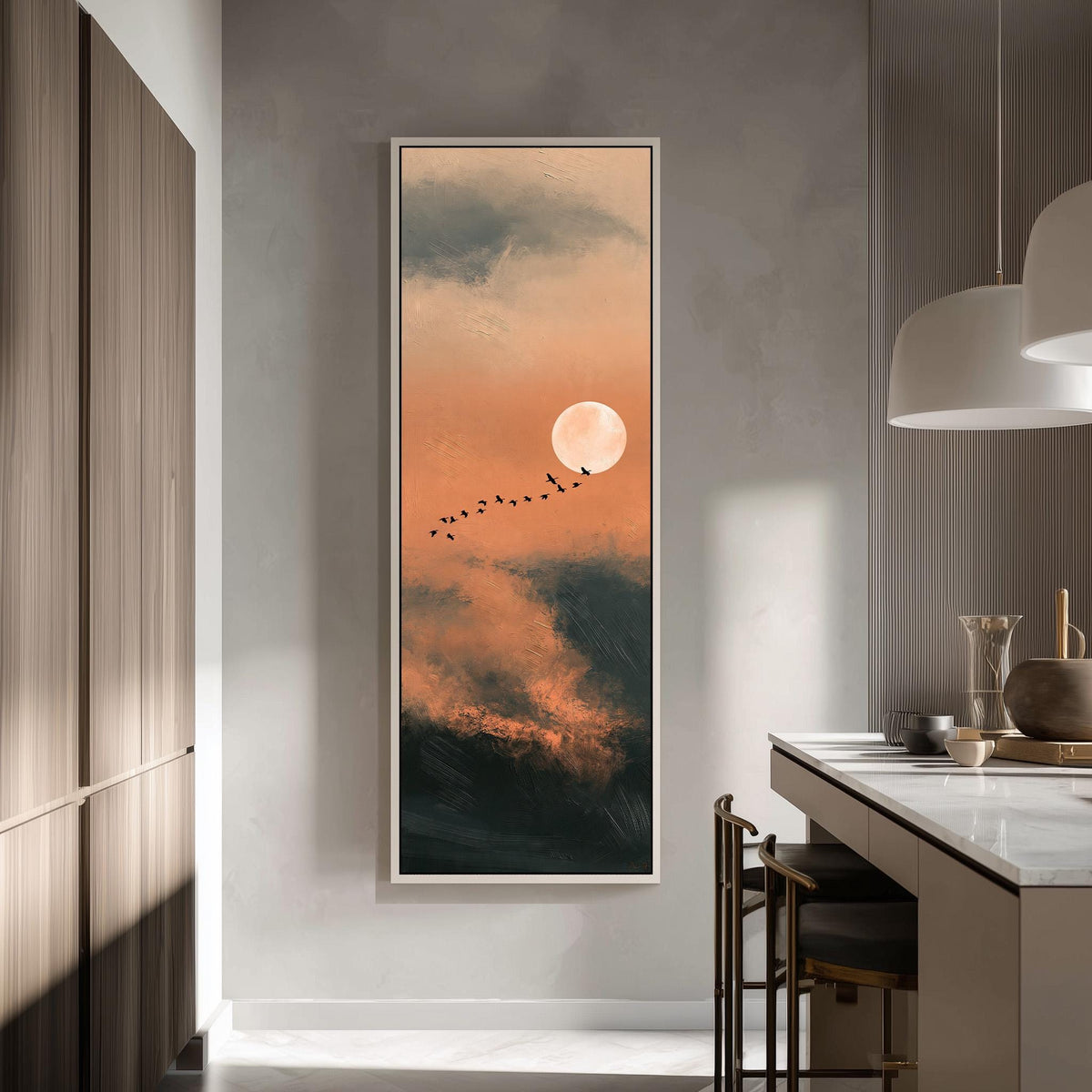 Birds flying past a rising moon in an orange sky tall skinny canvas print in a modern kitchen