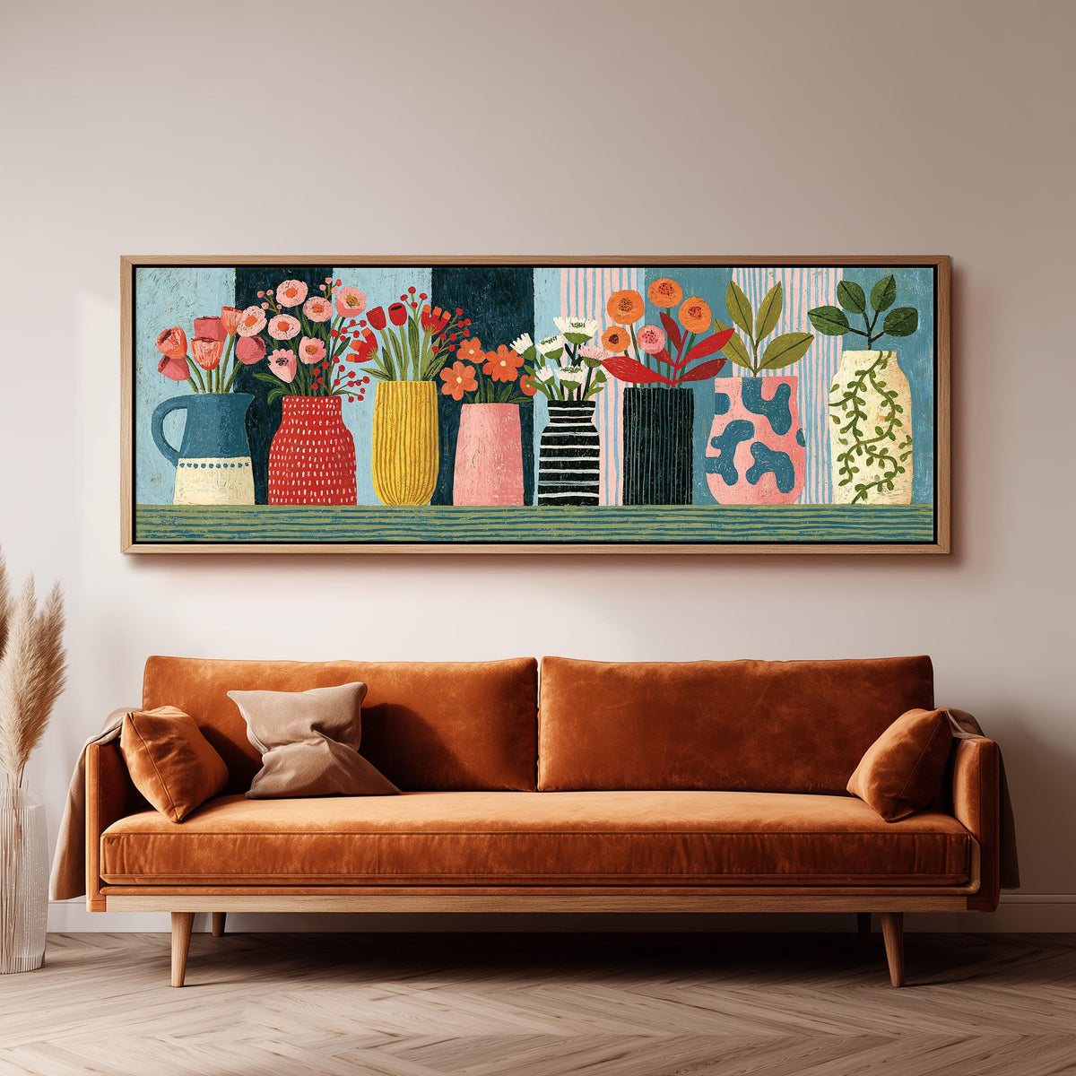 Row of folk art flower vases long horizontal canvas print above a sofa in a living room