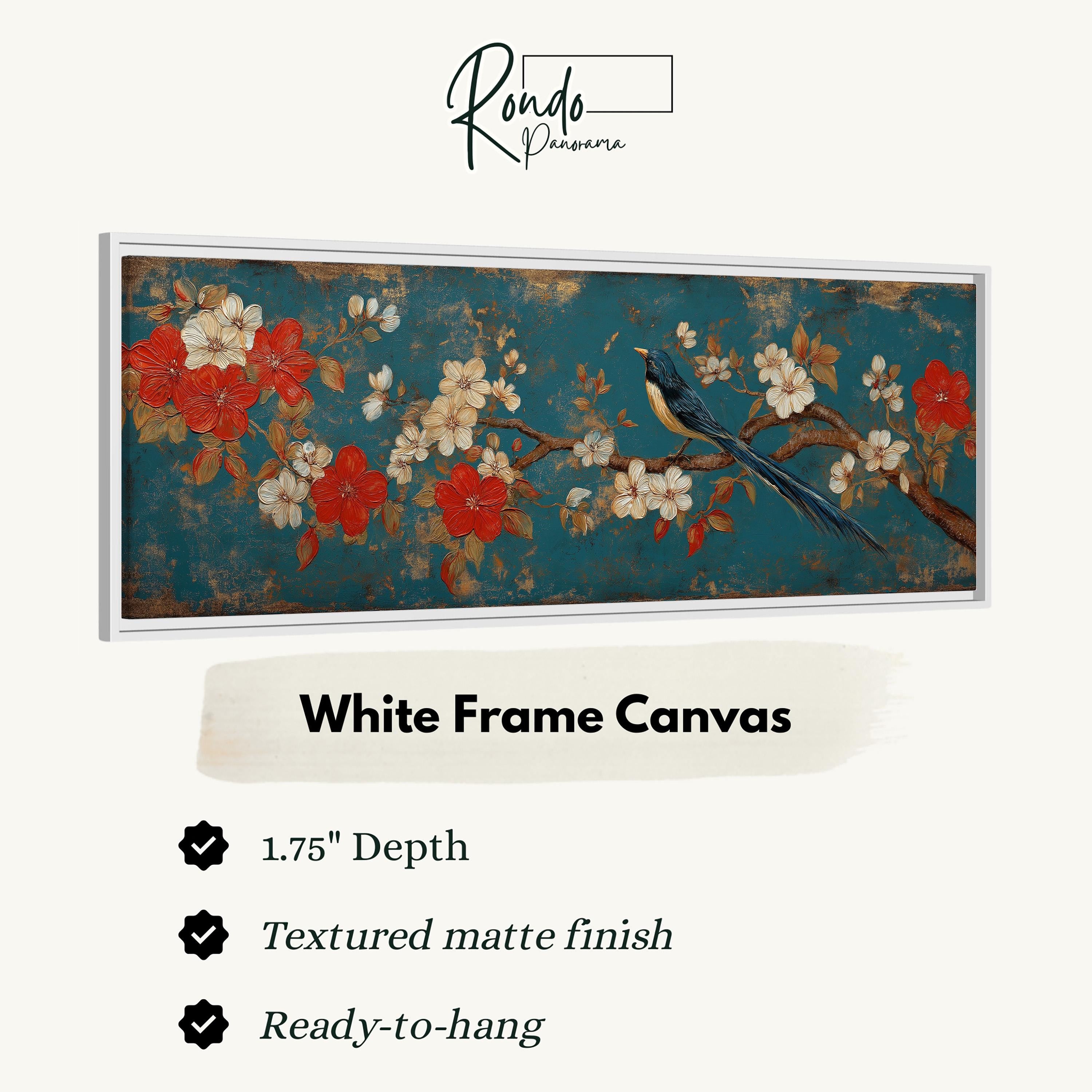 The image is a framed artwork depicting a bird perched on a branch with flowers. The artwork is described as a white frame canvas with a 1.75" depth and a textured matte finish. It is ready to hang and is described as a "white frame canvas" with a "textured matte finish".