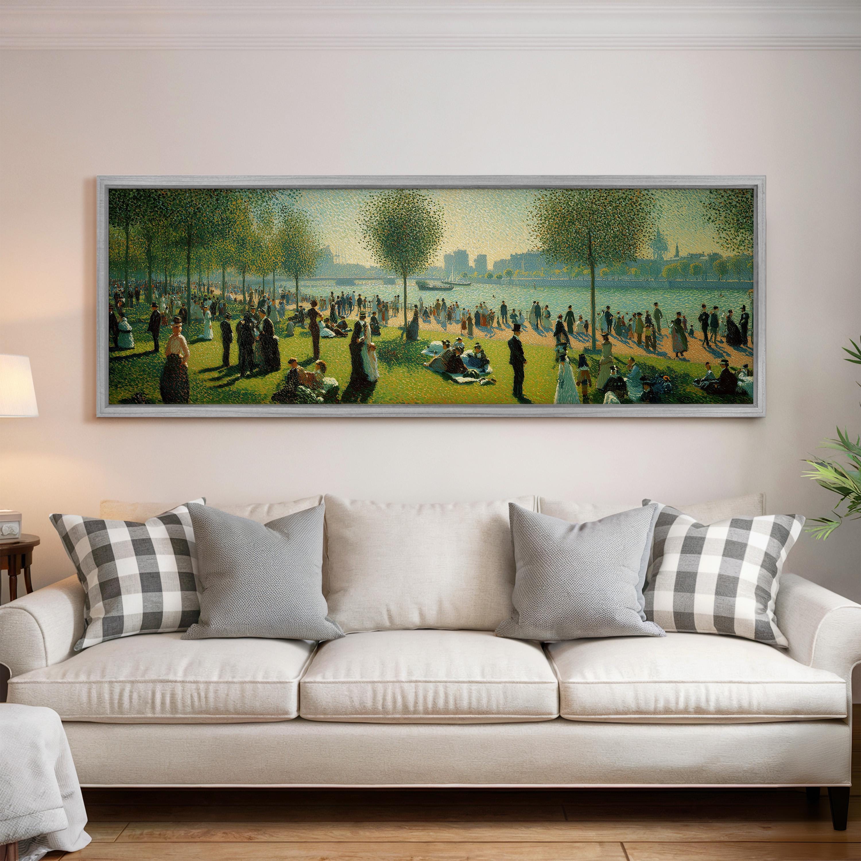 a large painting of a park scene hanging on a wall above a white sofa with decorative pillows.