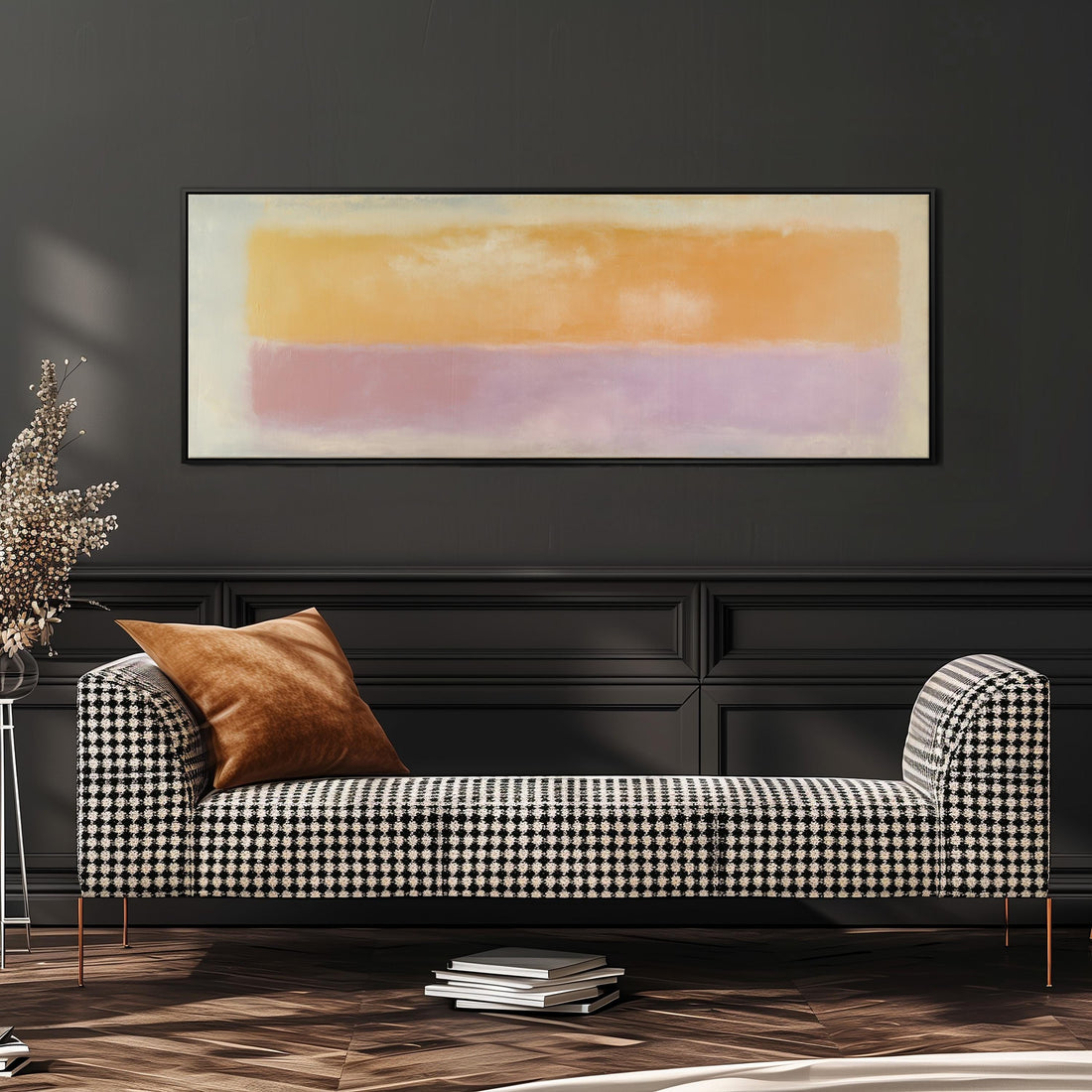 a large, rectangular painting hanging on a wall above a brown sofa with two pillows.