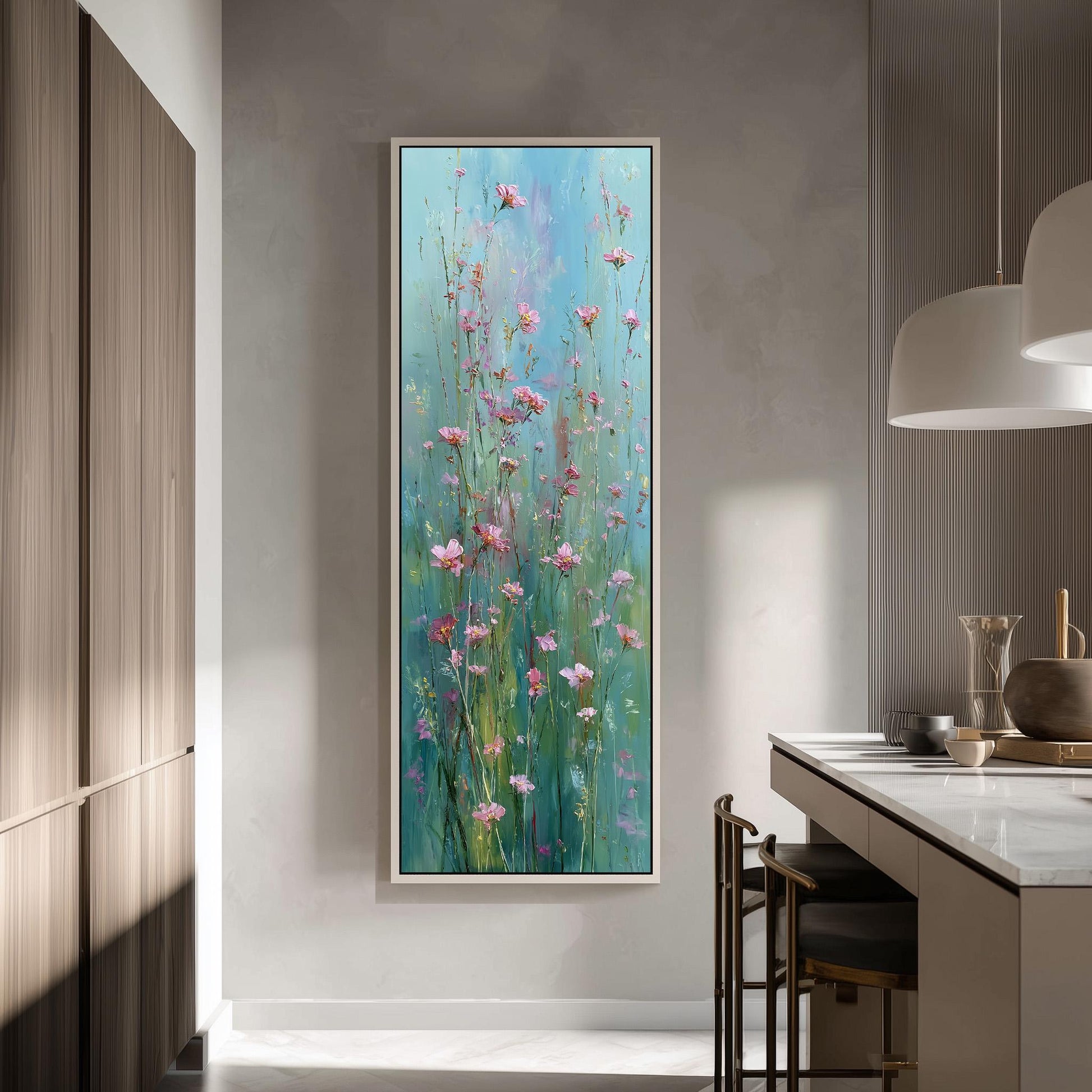 a large painting of pink flowers hanging on a wall in a modern kitchen.