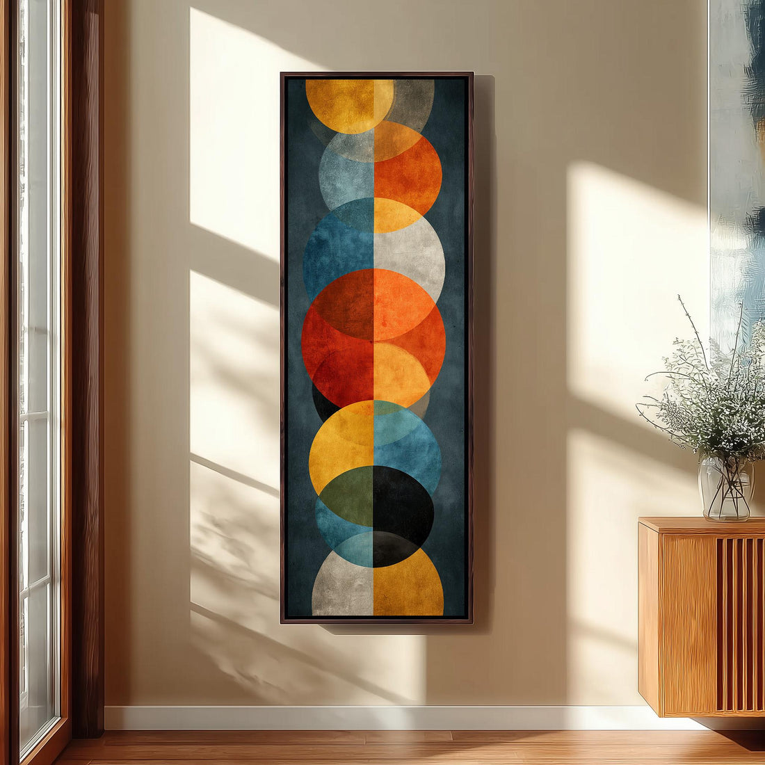 a modern and minimalist interior design with a large abstract painting hanging on the wall above a black bench. The painting consists of various circles in different sizes and colors, creating a visually striking and vibrant display. The room also includes a staircase, a potted plant, and a window, contributing to the overall contemporary aesthetic.