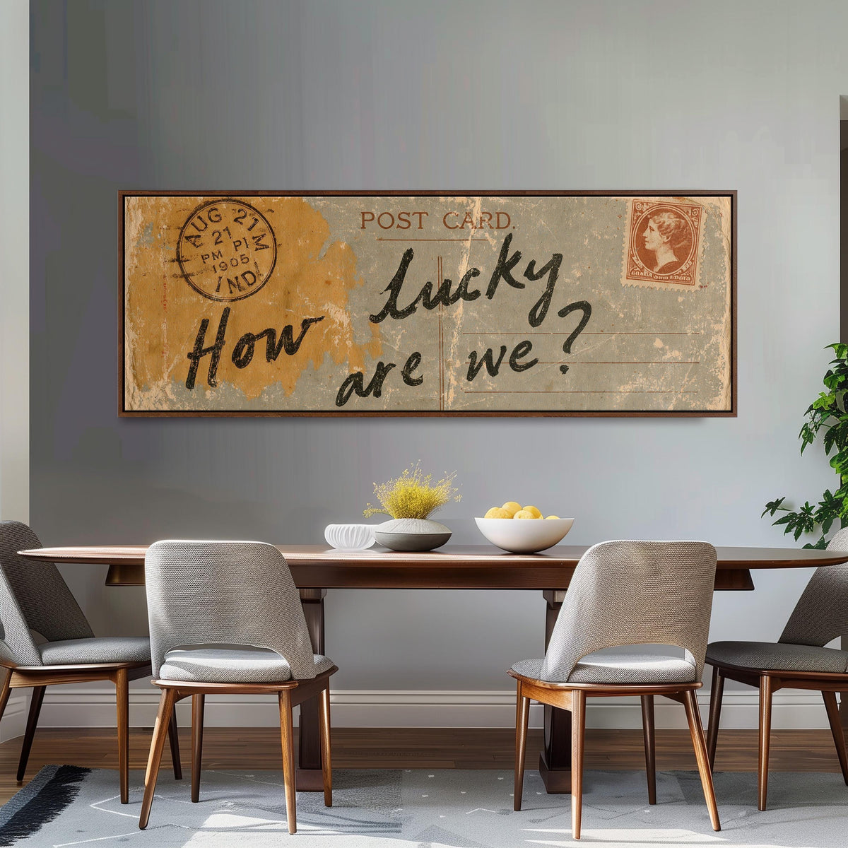 Vintage postcard saying how lucky are we long horizontal canvas print above a dining table