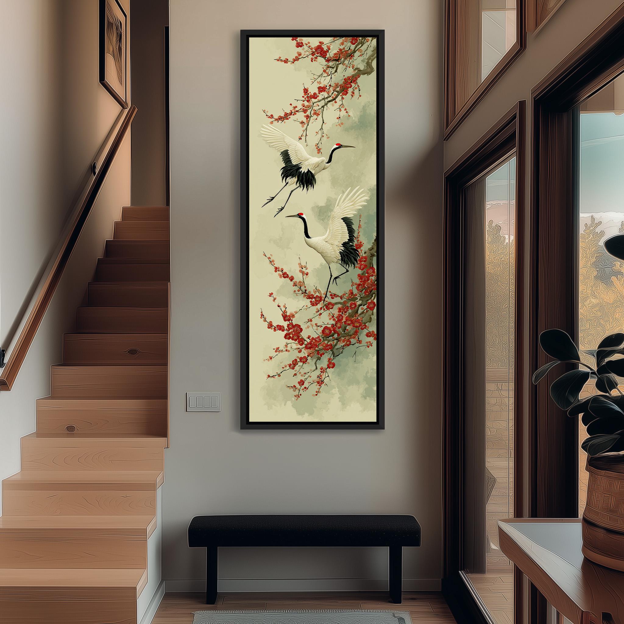 a hallway with a large painting of two white birds with black beaks and wings, perched on a branch with red flowers, hanging on the wall above a bench.
