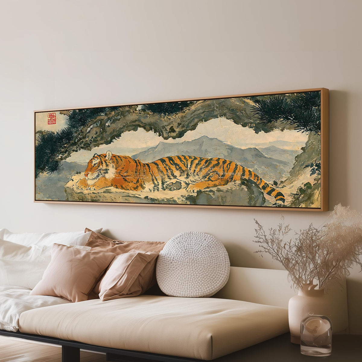 Tiger resting beneath misty pines panoramic canvas print above a sofa in a living room