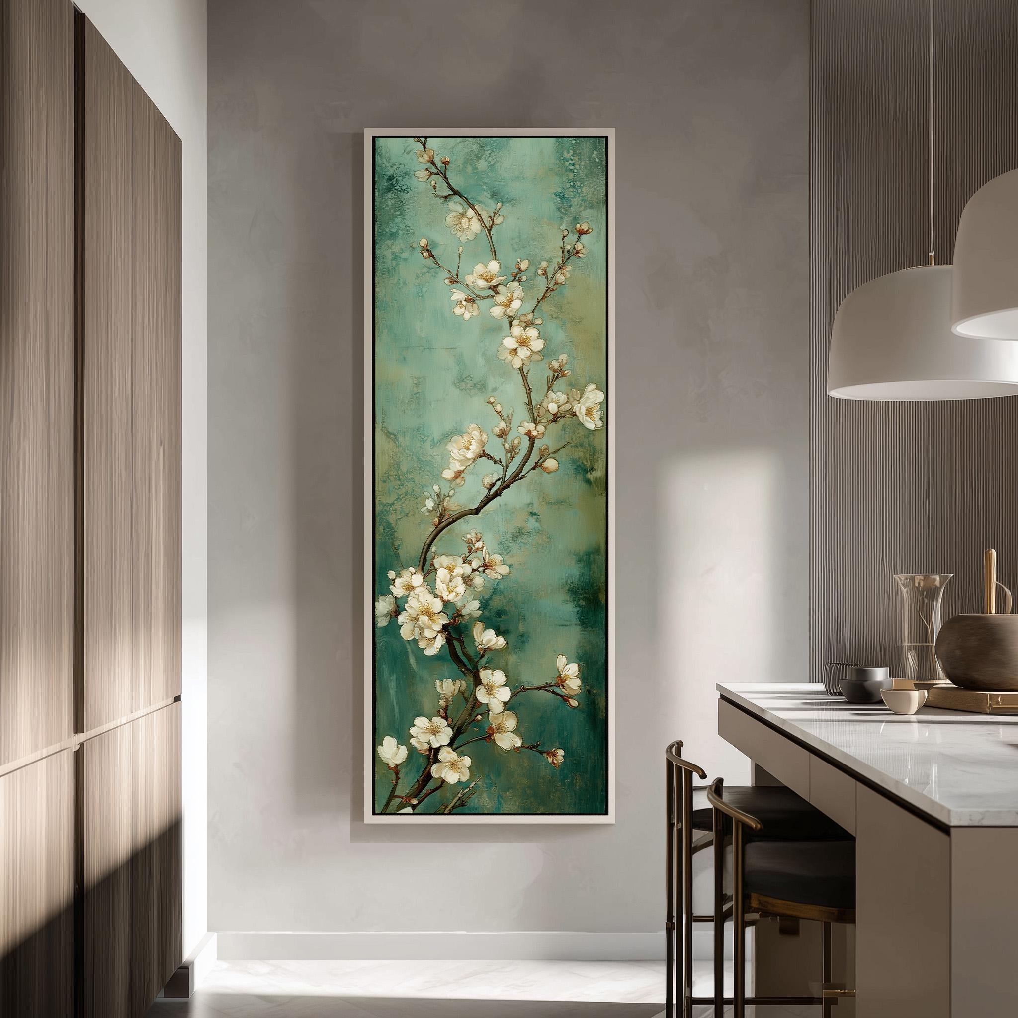 a large framed painting of white flowers on a green background hanging on a wall in a modern kitchen.