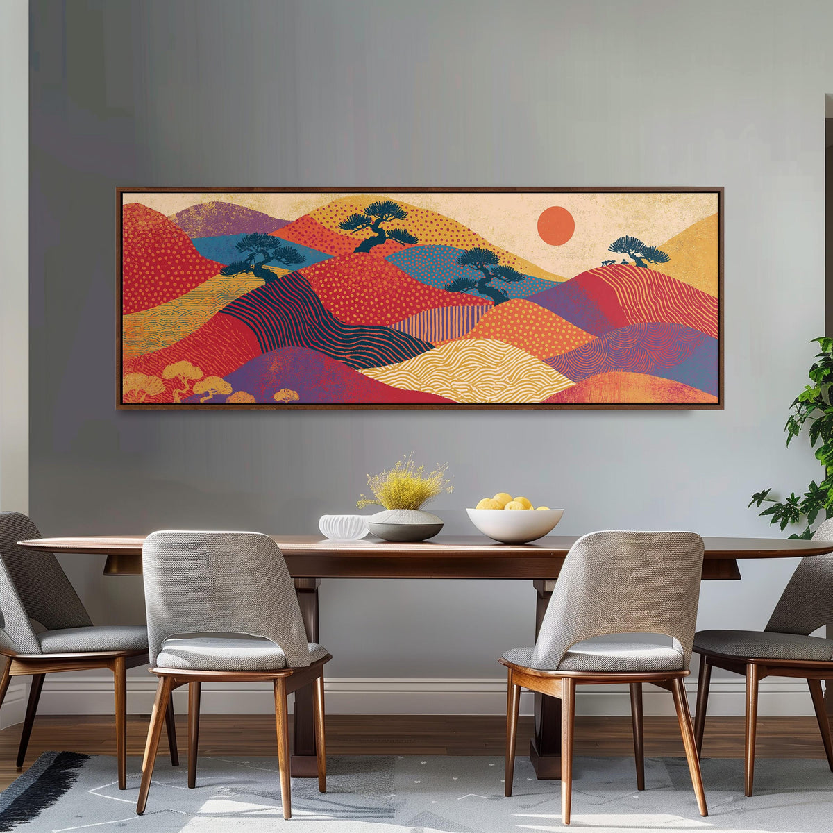 Bonsai trees on patterned hills with a red sun long horizontal canvas print above a dining table