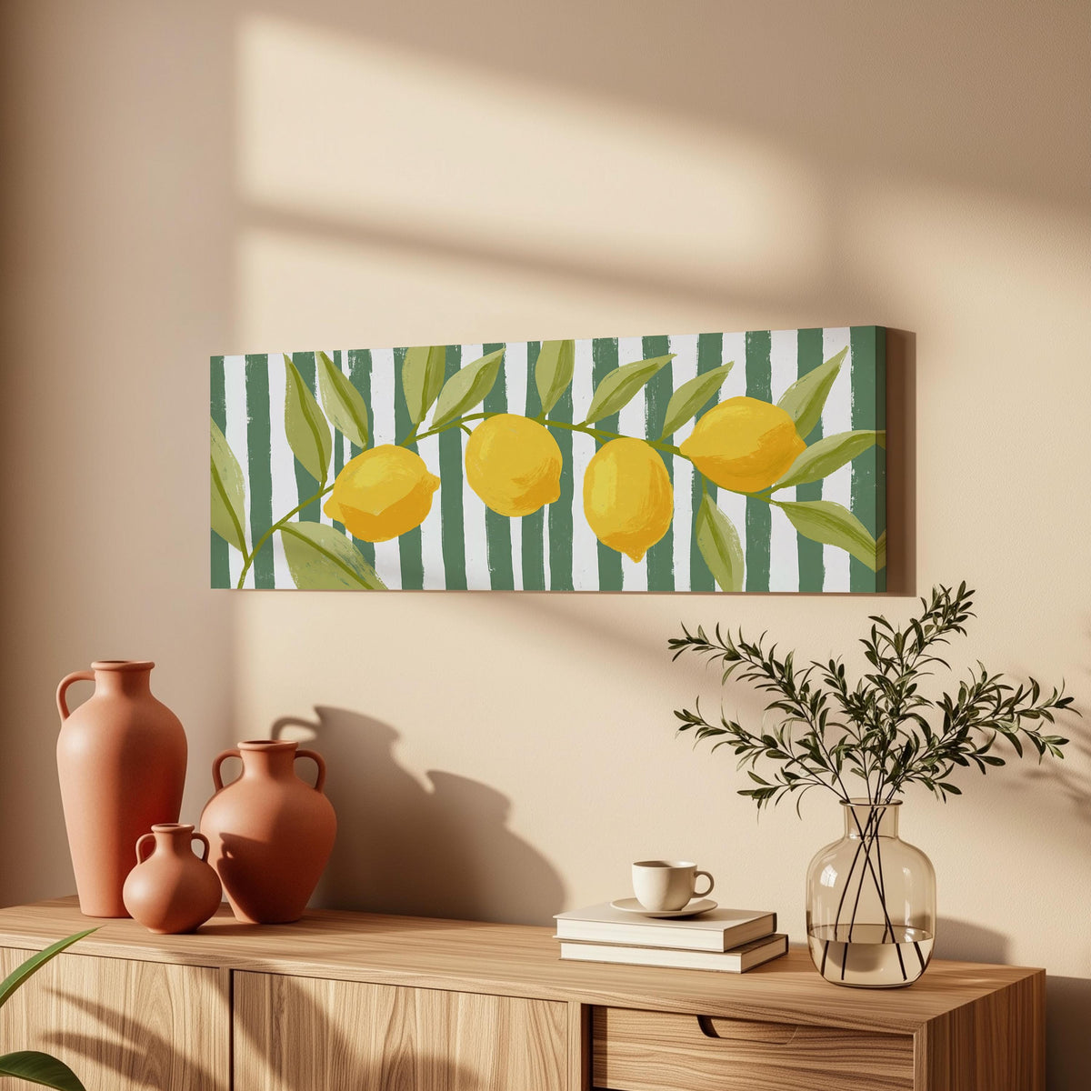 Lemon branch on green stripes long horizontal canvas print above a wooden sideboard