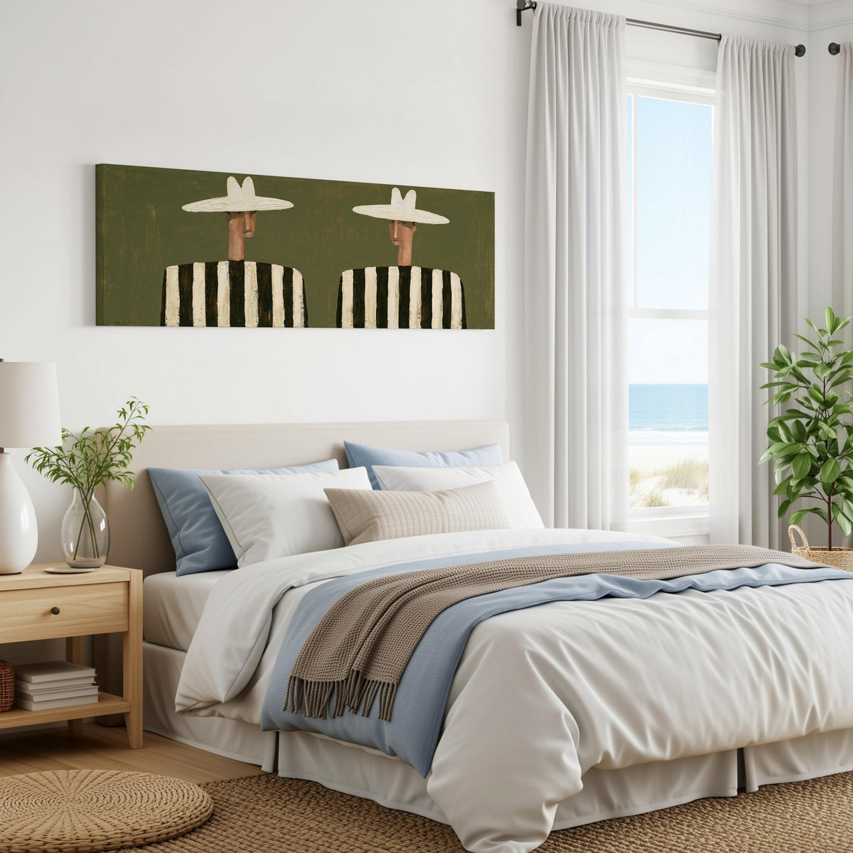 Two figures in striped shirts panoramic canvas print above a bed in a coastal bedroom