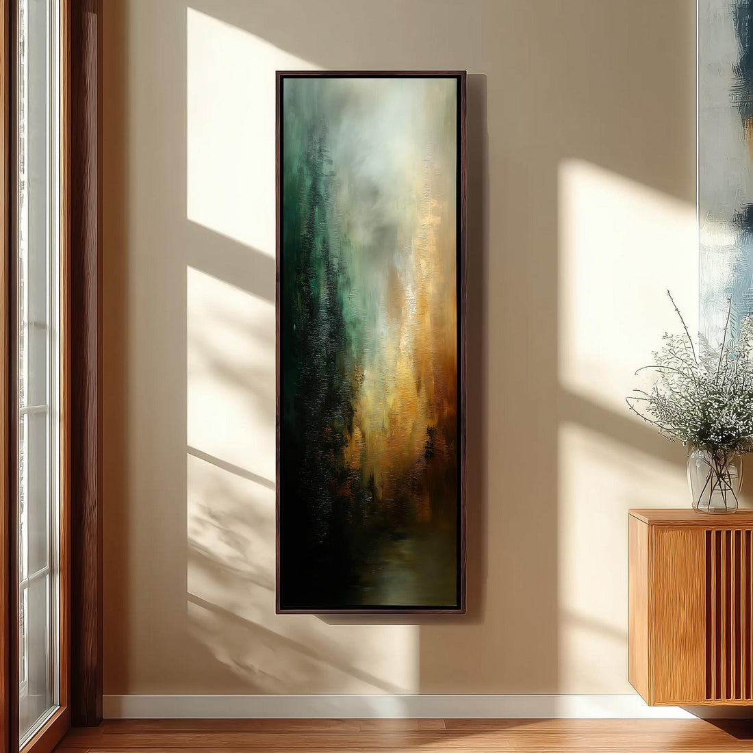 a large, abstract painting hanging on a wall in a room with a wooden floor and a window.