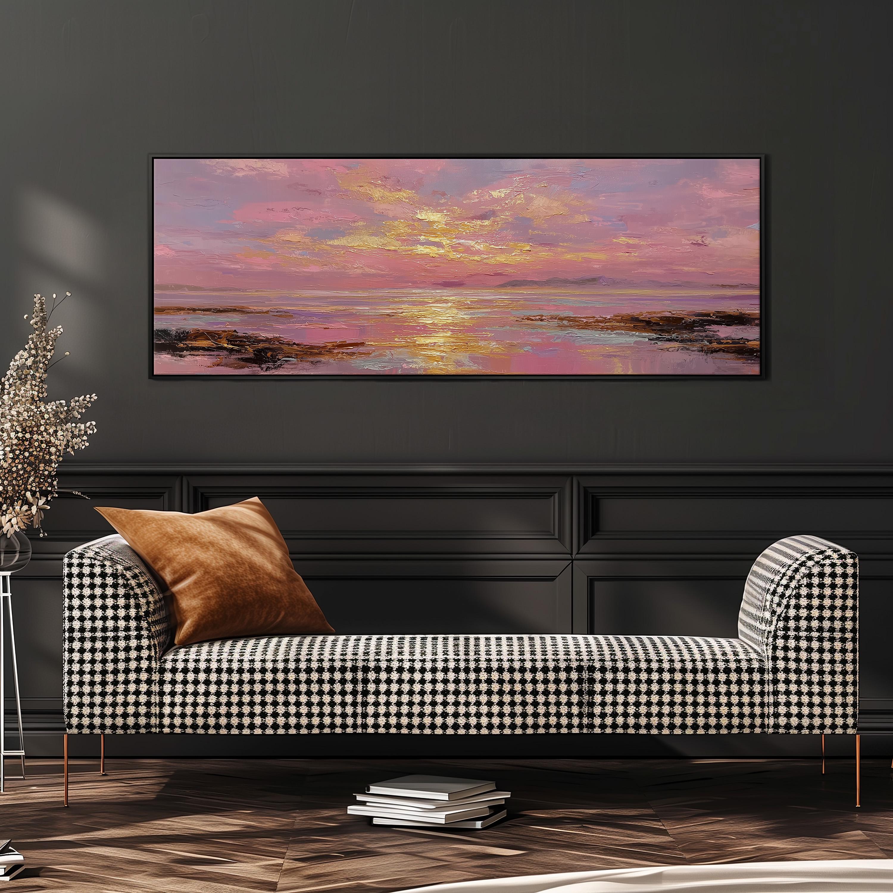 a large, colorful painting of a sunset over a body of water, hanging on a wall above a black and white checkered sofa.