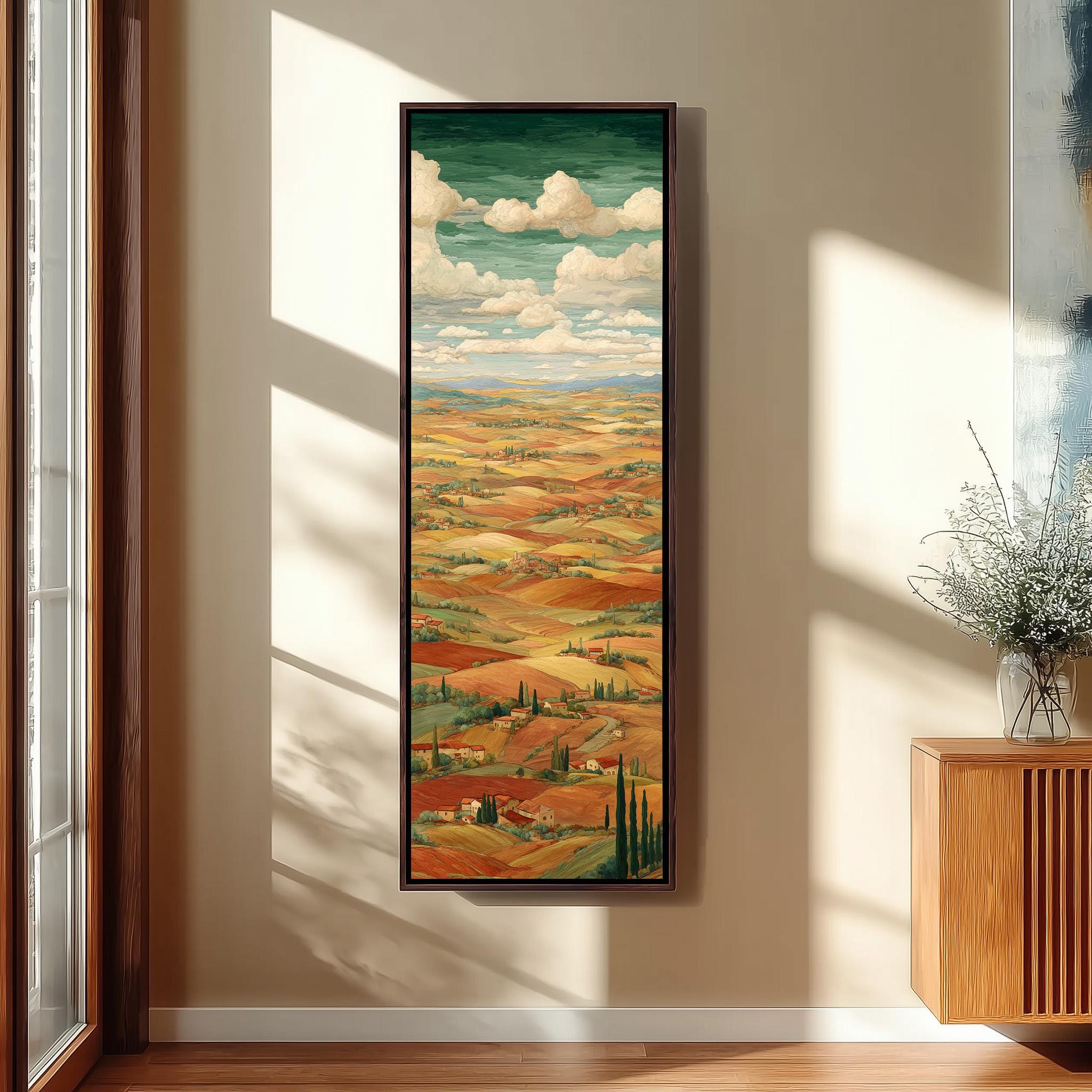 a large, colorful painting of a countryside landscape hanging on a wall.