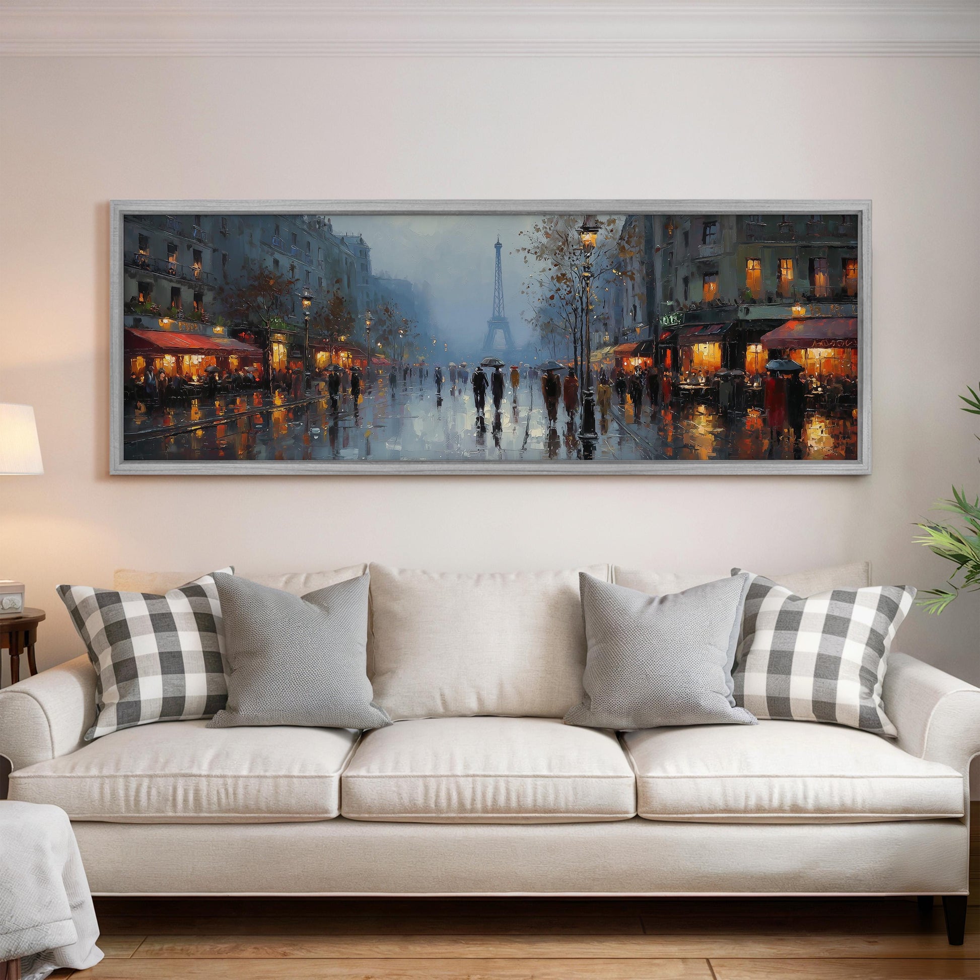a large painting of a city street scene with people walking on the sidewalk and buildings illuminated at night.