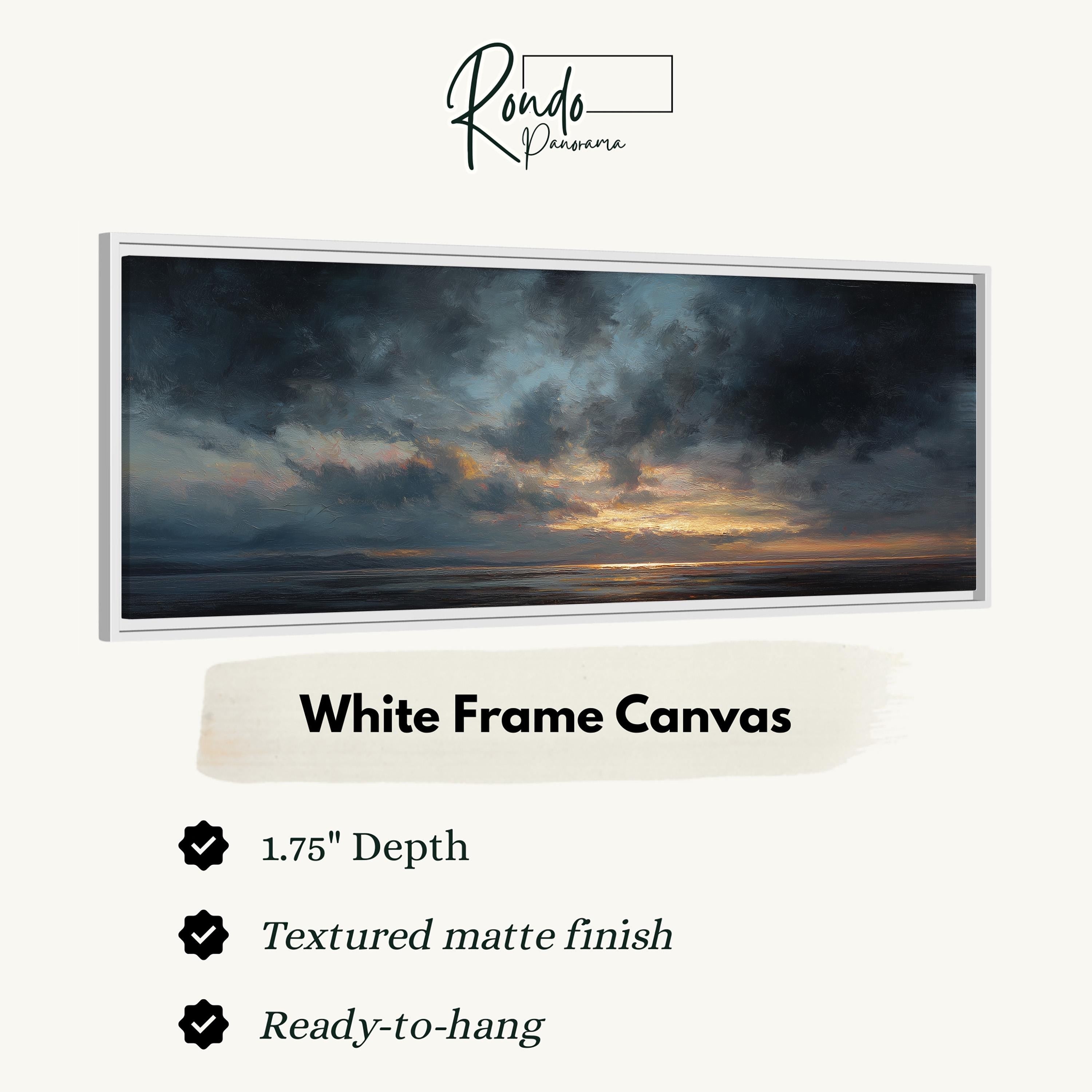 The image is a white frame canvas depicting a serene landscape with a sunset over the ocean.