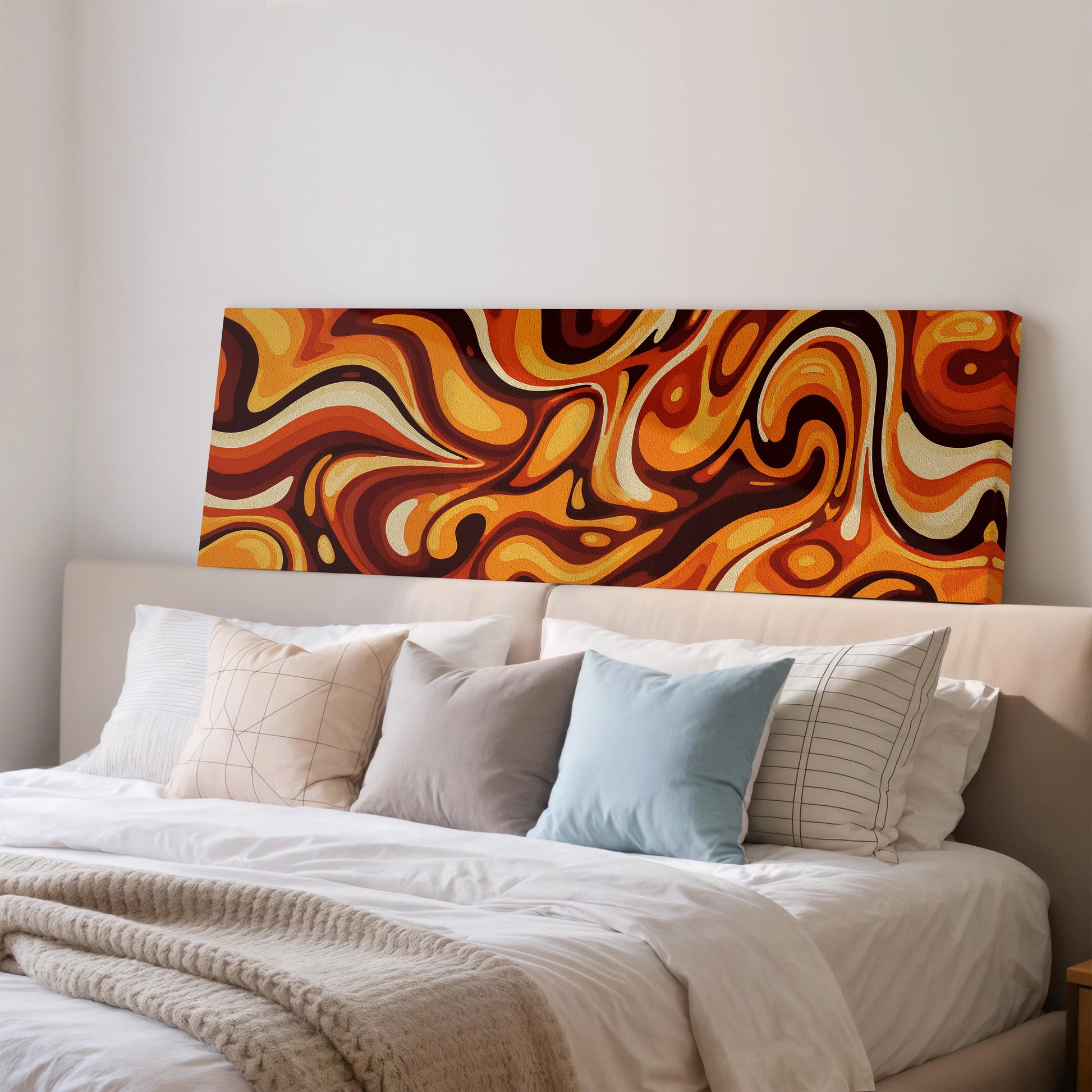 a large bed with a white comforter and a colorful abstract painting hanging above it.