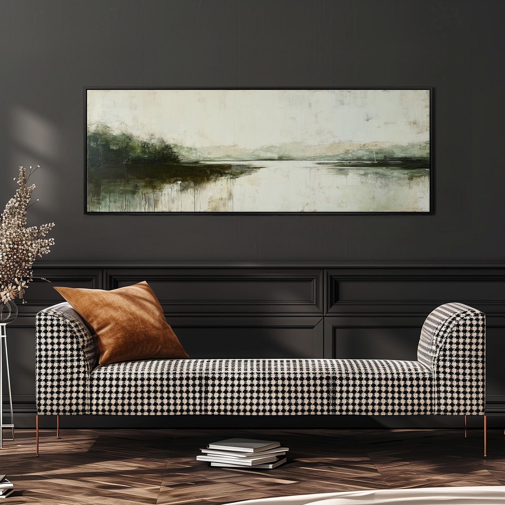 a black and white checkered sofa with a brown throw pillow, set against a dark wall with a large landscape painting hanging above it.