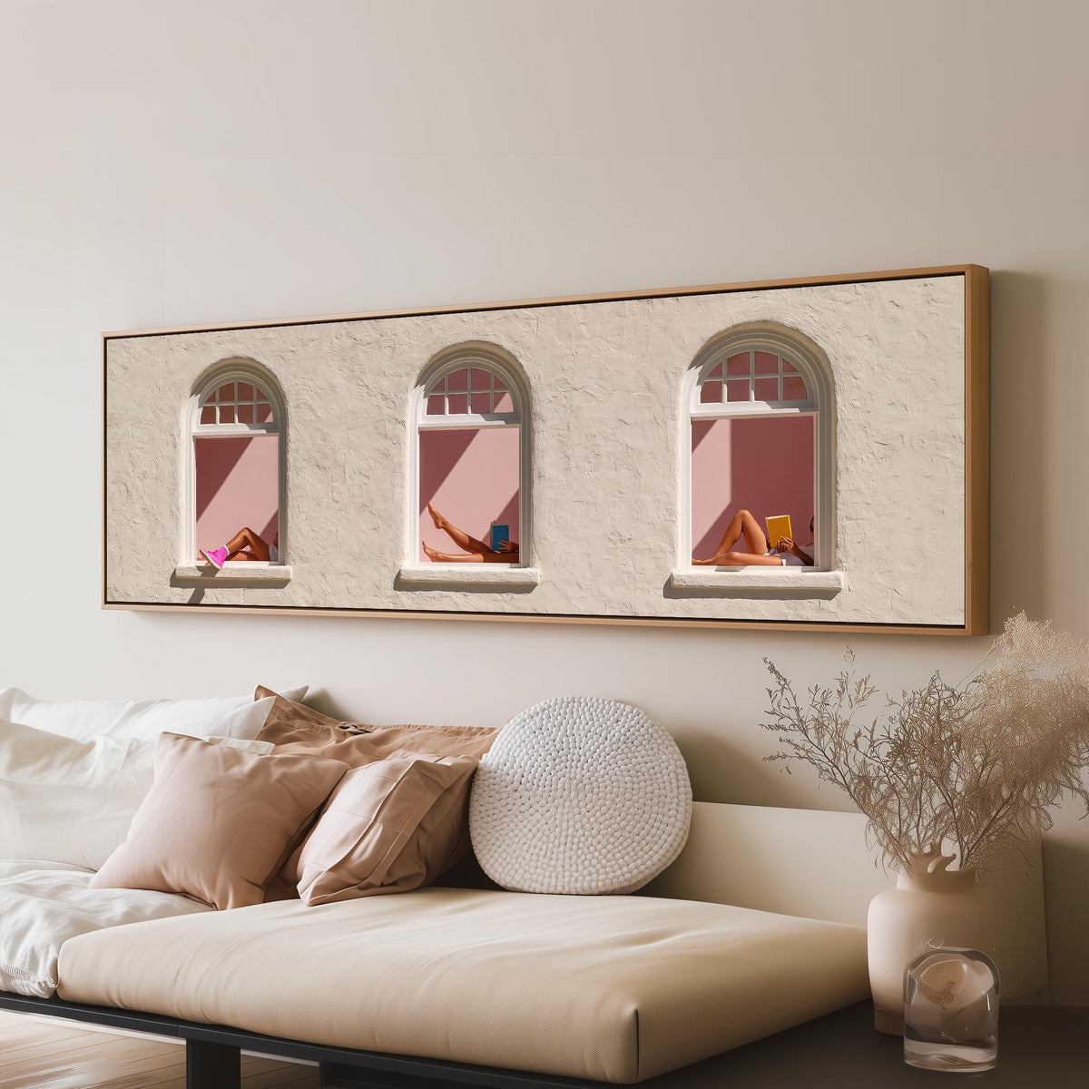 Women reading in three arched windows long horizontal canvas print above a sofa in a living room