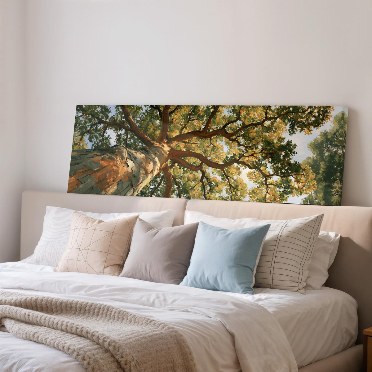 Autumn oak canopy seen from below wide panoramic canvas print above a bed in a bedroom