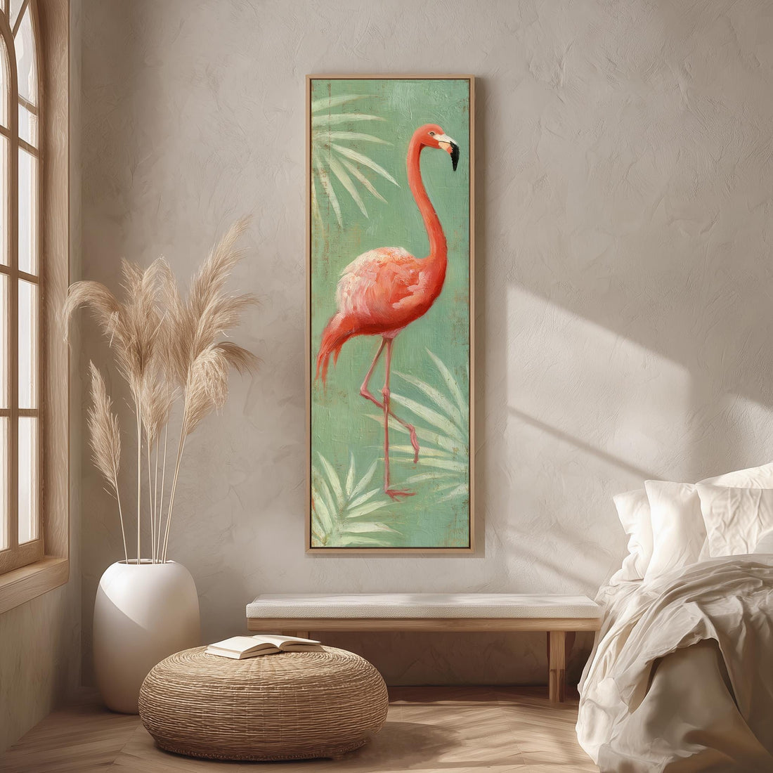 a large framed painting of a flamingo standing on one leg, hanging on a wall in a room with a bed, a potted plant, and a woven ottoman.
