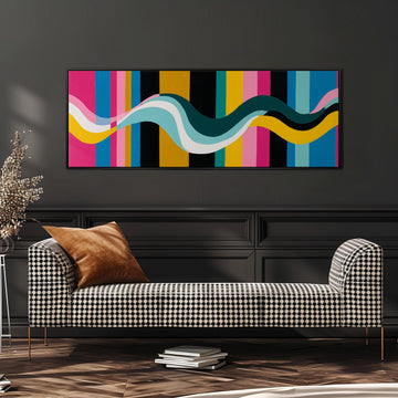 a modern living room with a checkered sofa, a stack of books, and a large abstract painting on the wall.