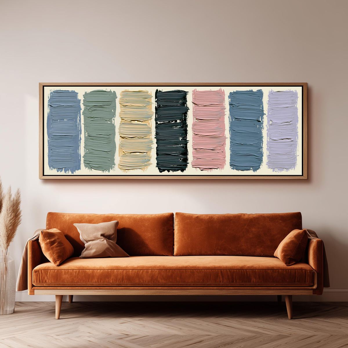 Pastel brushstroke color swatches panoramic canvas print above a sofa in a living room