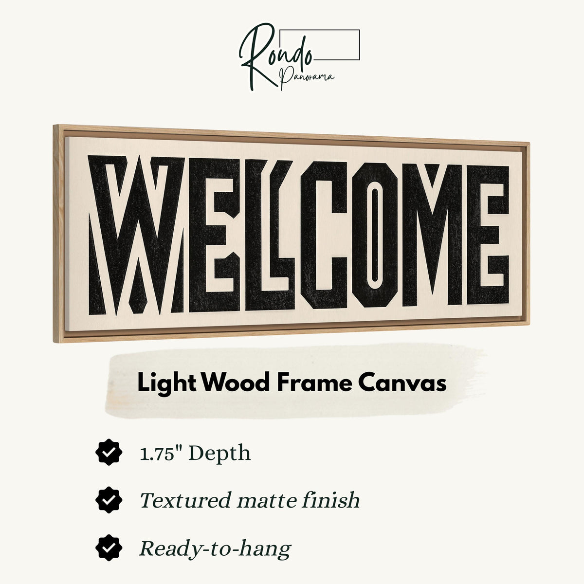 Bold welcome block letters canvas print in a light wood floating frame