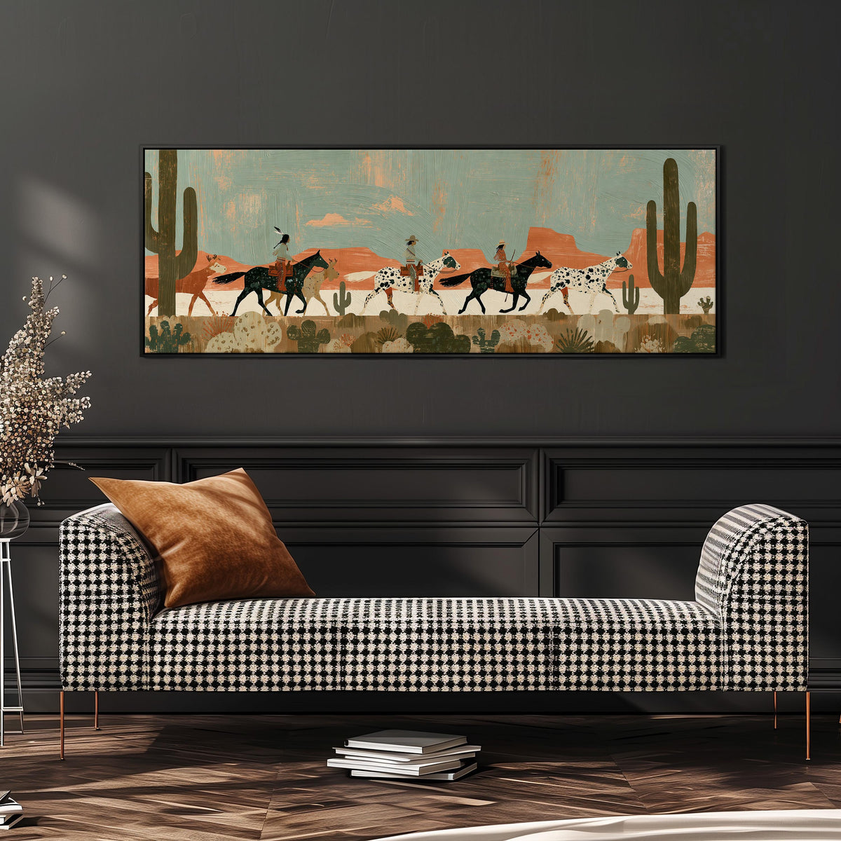Riders on spotted horses across a red rock desert wide panoramic canvas print above a bench in a dark living room