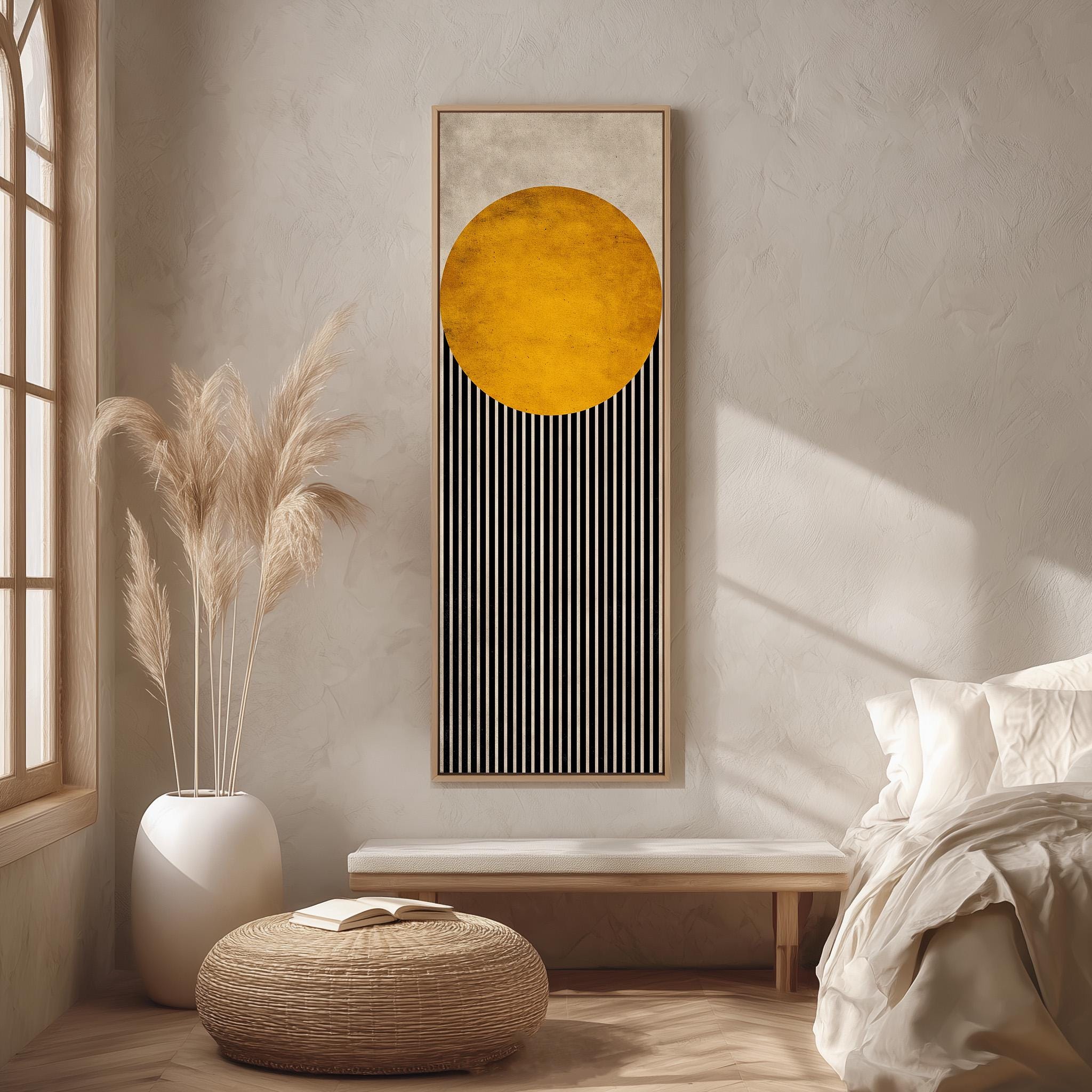 a minimalist bedroom interior with a large abstract painting featuring a yellow circle and black vertical stripes hanging on the wall. The room has a bed, a white ottoman, and a potted plant, creating a serene and modern atmosphere.