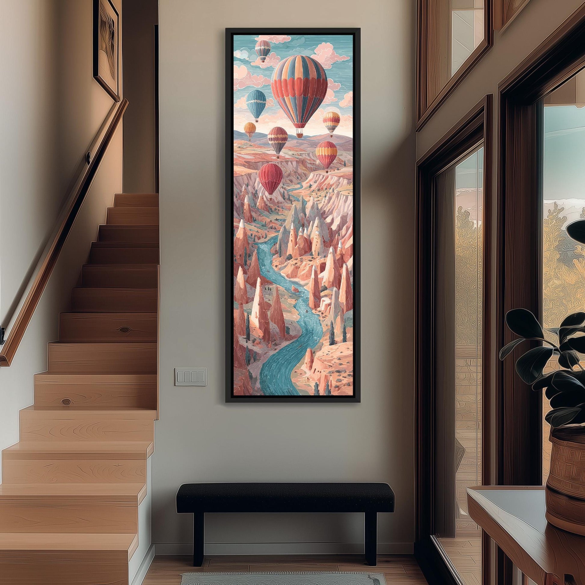 a large, colorful painting of a hot air balloon scene hanging on the wall of a hallway.