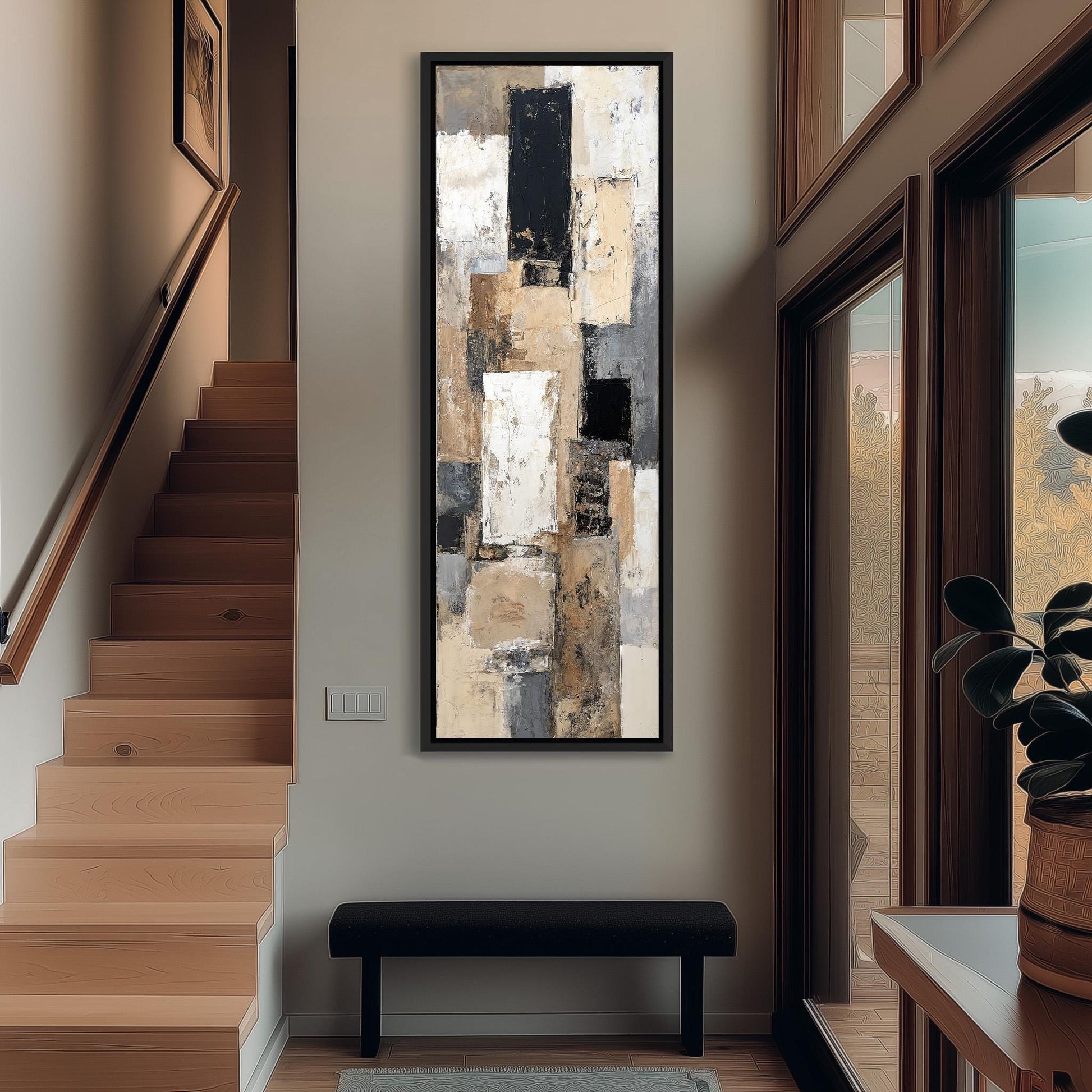 a modern interior design with a large abstract painting hanging on the wall above a black bench. The painting has a mix of warm and cool colors, creating a visually striking contrast. The room also includes a staircase, a potted plant, and a window, contributing to the overall aesthetic and atmosphere of the space.