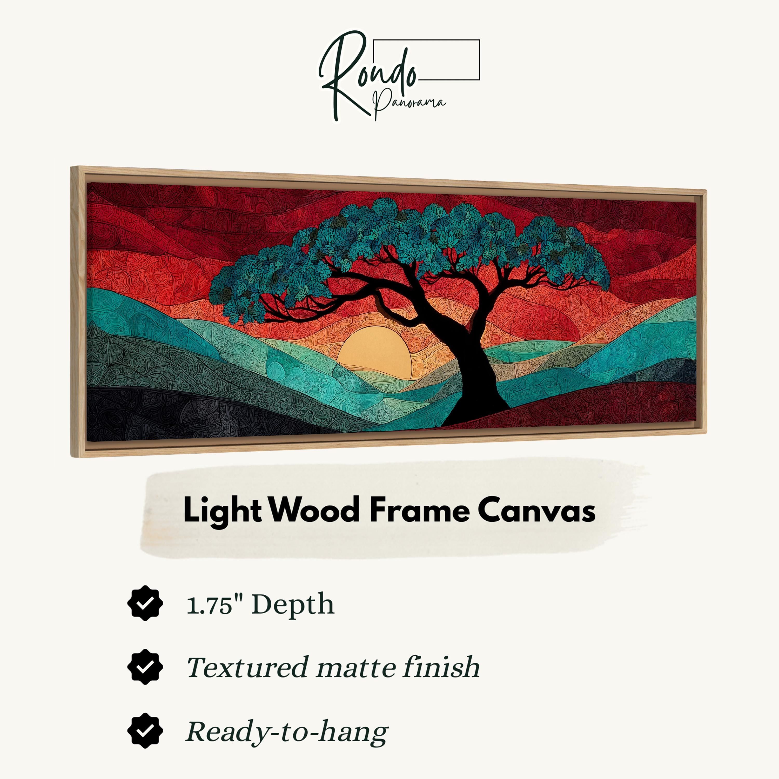 The image is a framed artwork depicting a tree with a sunset landscape.