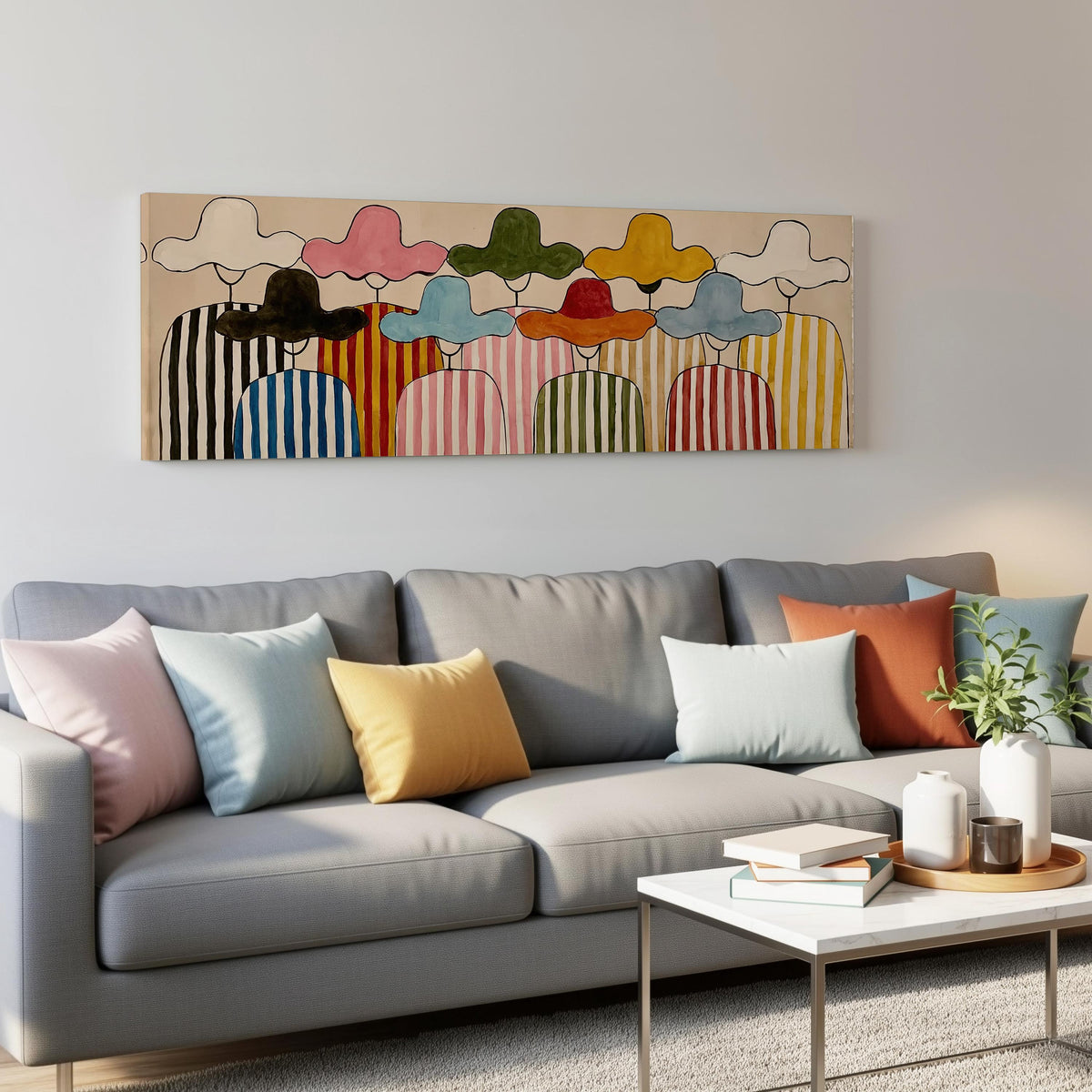 Gathering of figures in straw hats and stripes panoramic canvas print above a grey sofa in a living room