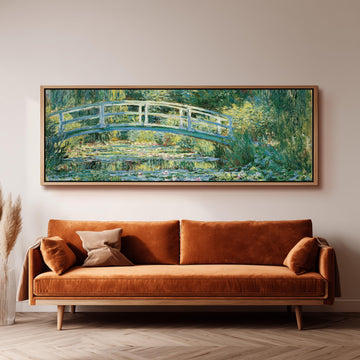 Japanese bridge over a water lily pond long horizontal canvas print above a sofa in a living room