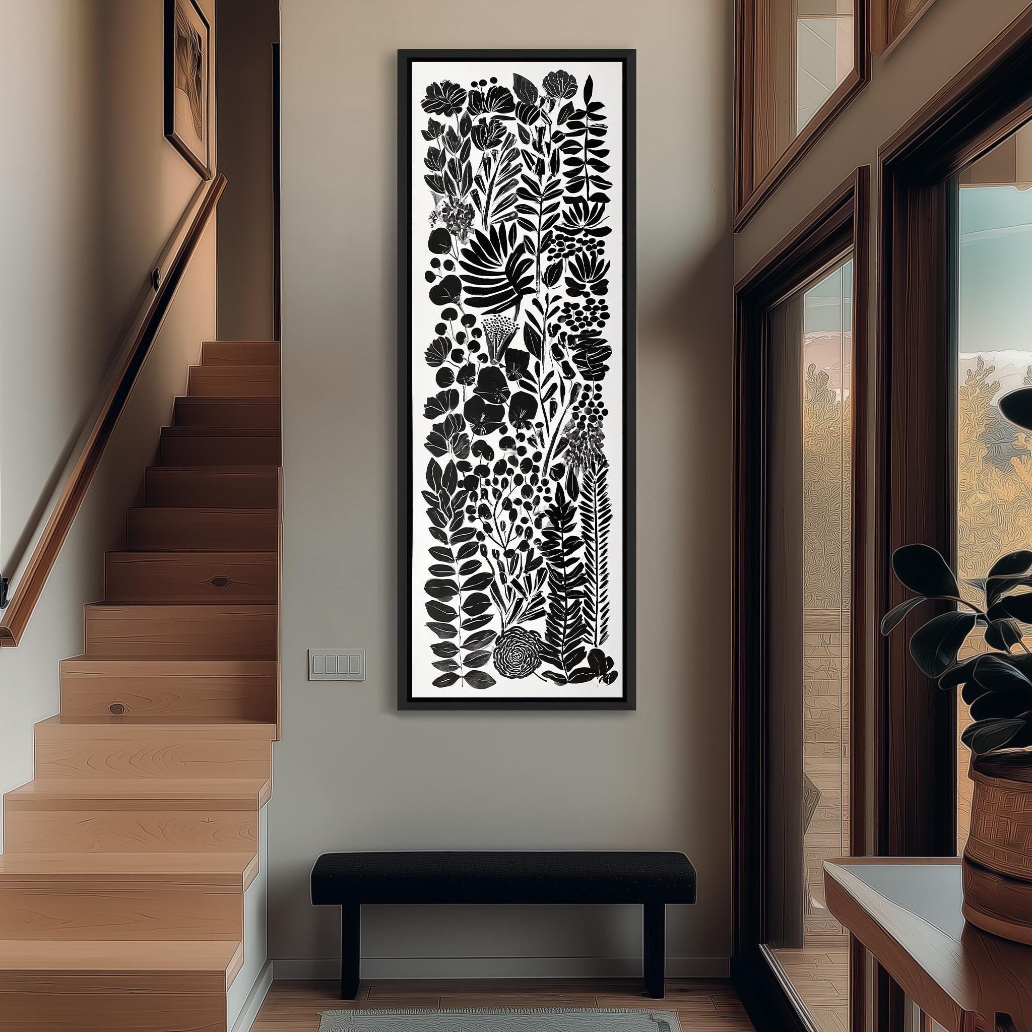 a modern and minimalist interior design with a large black and white abstract artwork hanging on the wall above a black bench.
