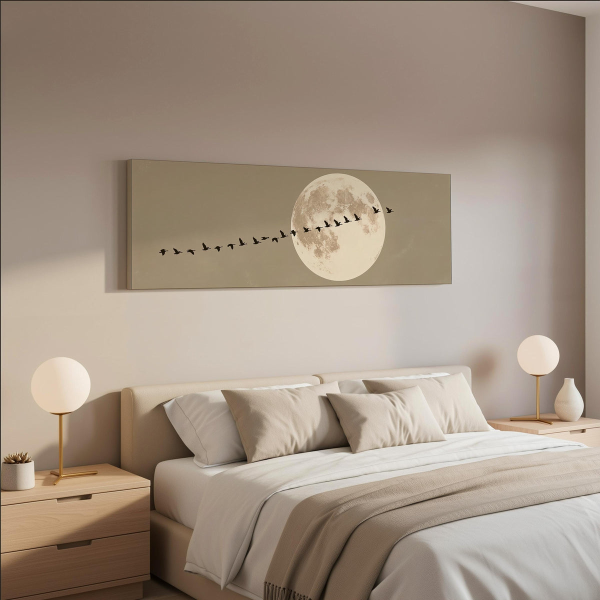 Geese flying past a full moon wide panoramic canvas print above a bed in a neutral bedroom