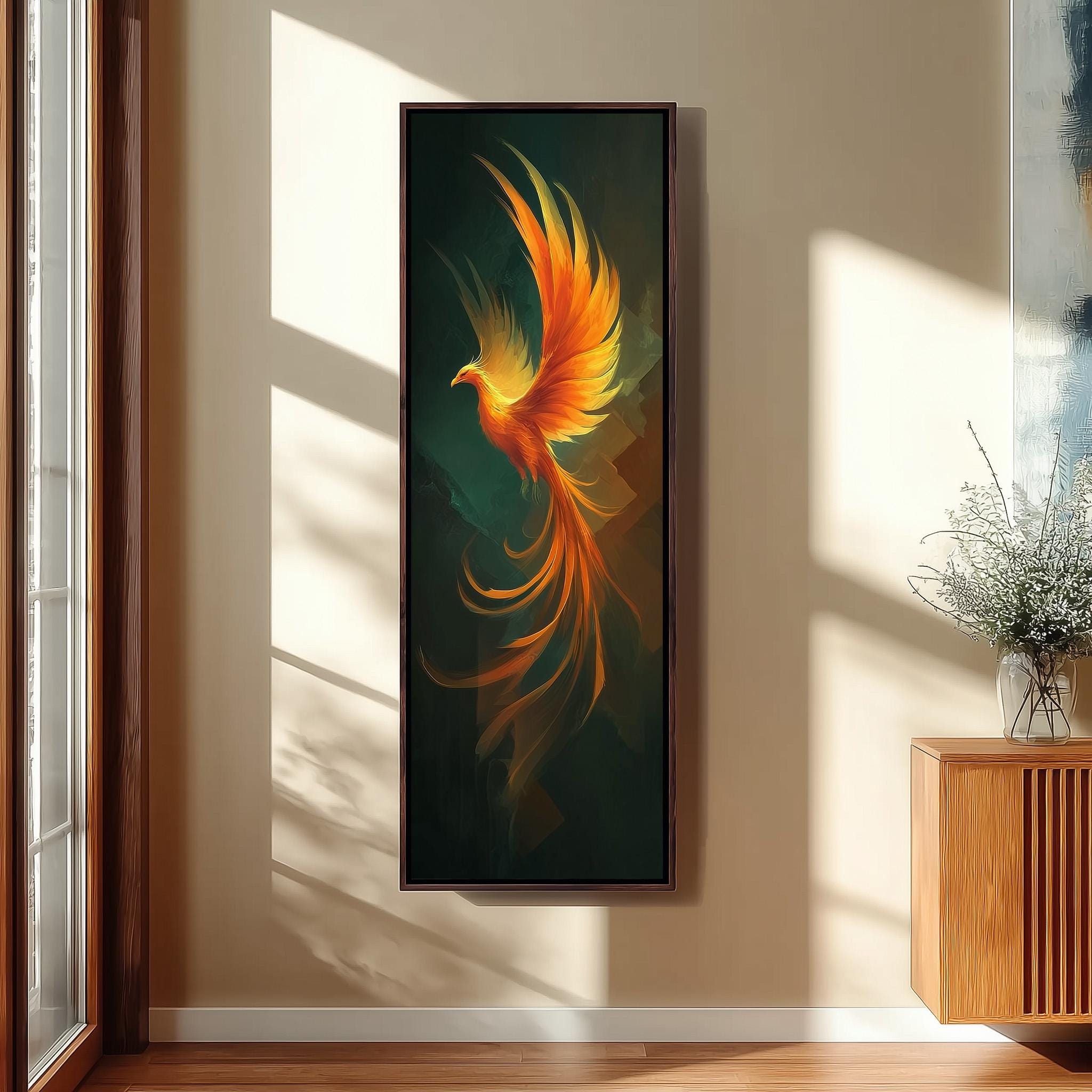 a large framed painting of a vibrant, colorful phoenix with its wings spread wide, set against a dark green background.