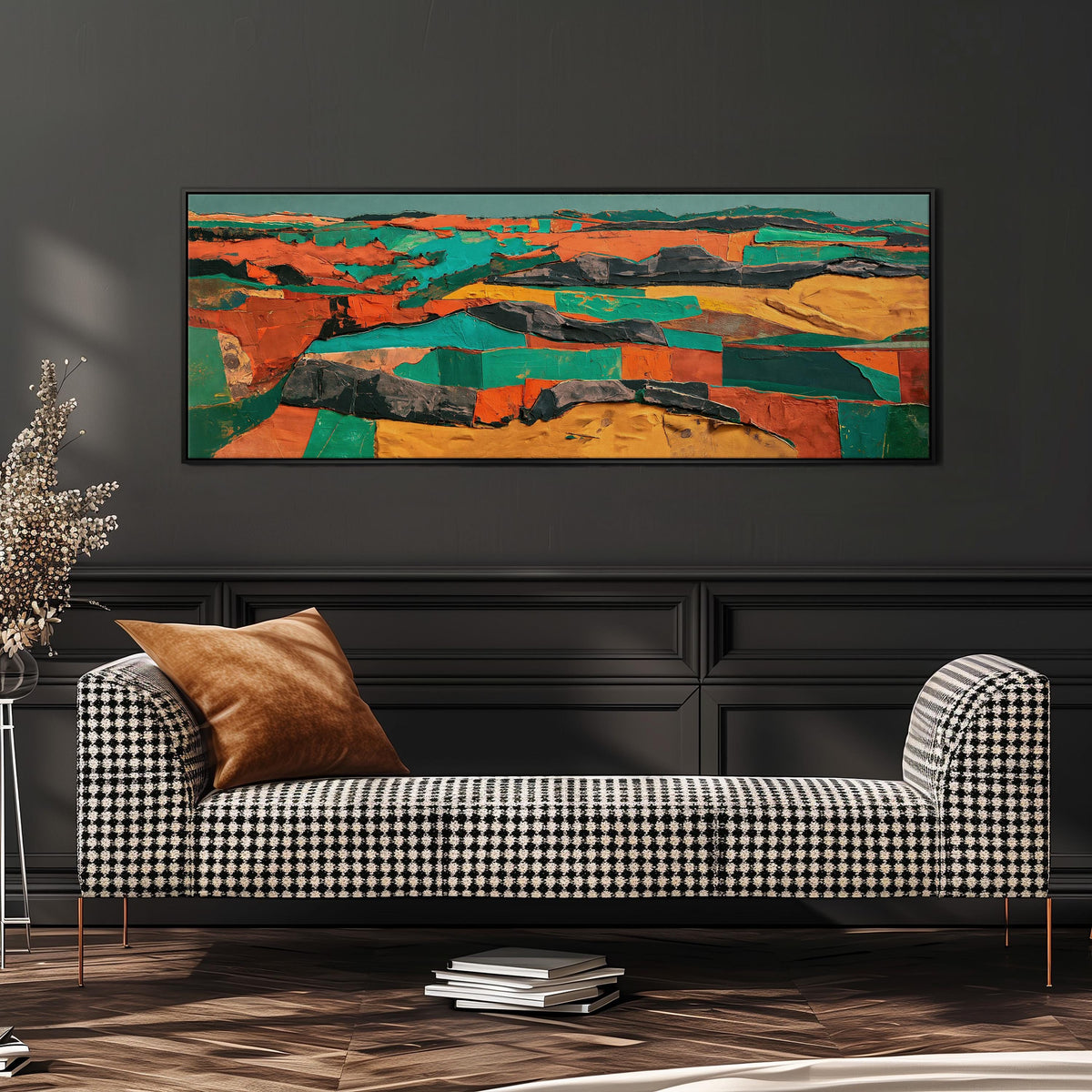 Abstract patchwork terrain in orange and teal wide panoramic canvas print above a bench in a dark living room